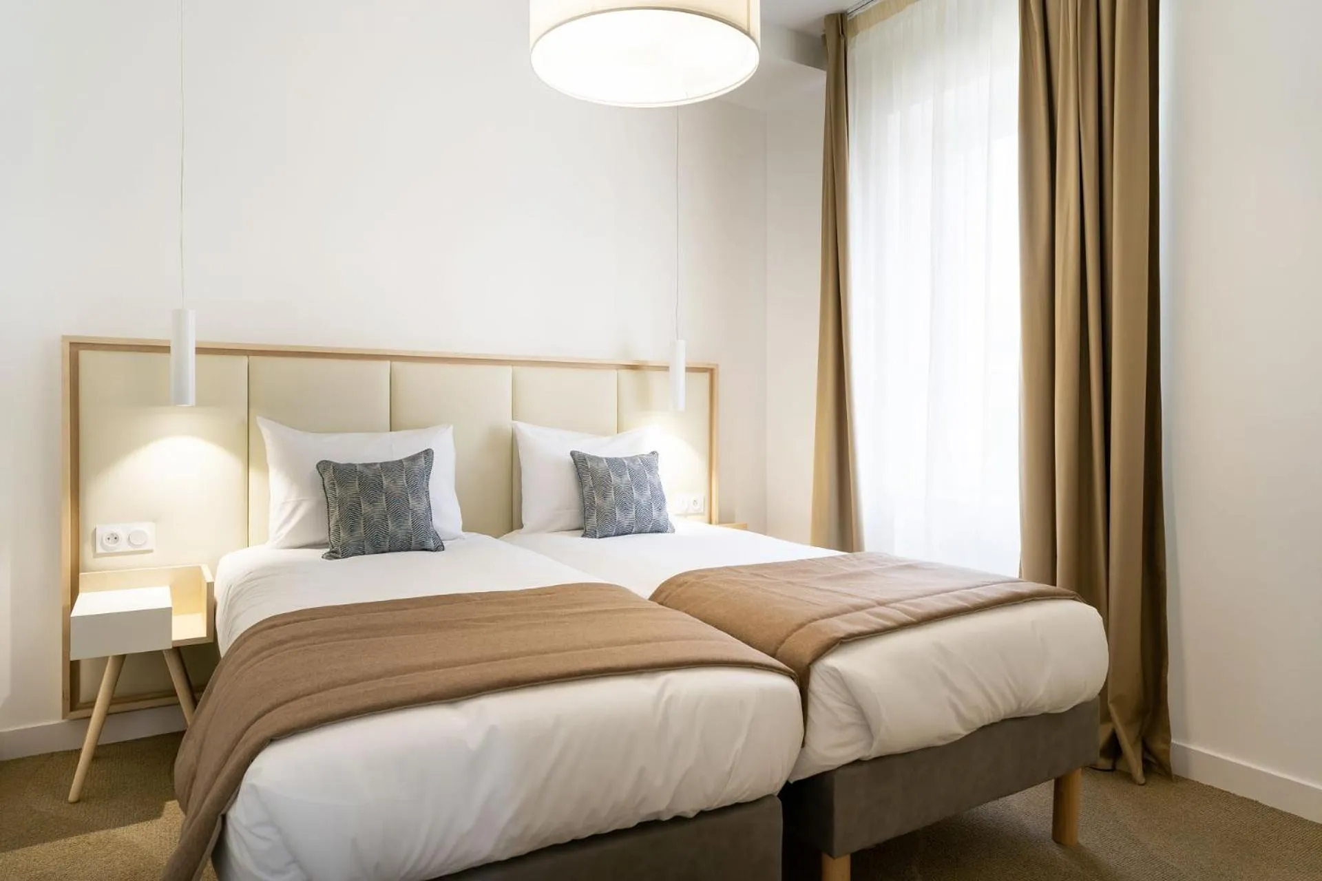 Bed in Hôtel Miléade Les Pléïades La Baule