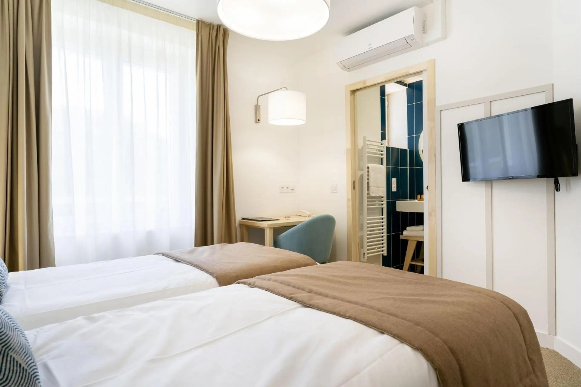 Bed in Hôtel Miléade Les Pléïades La Baule