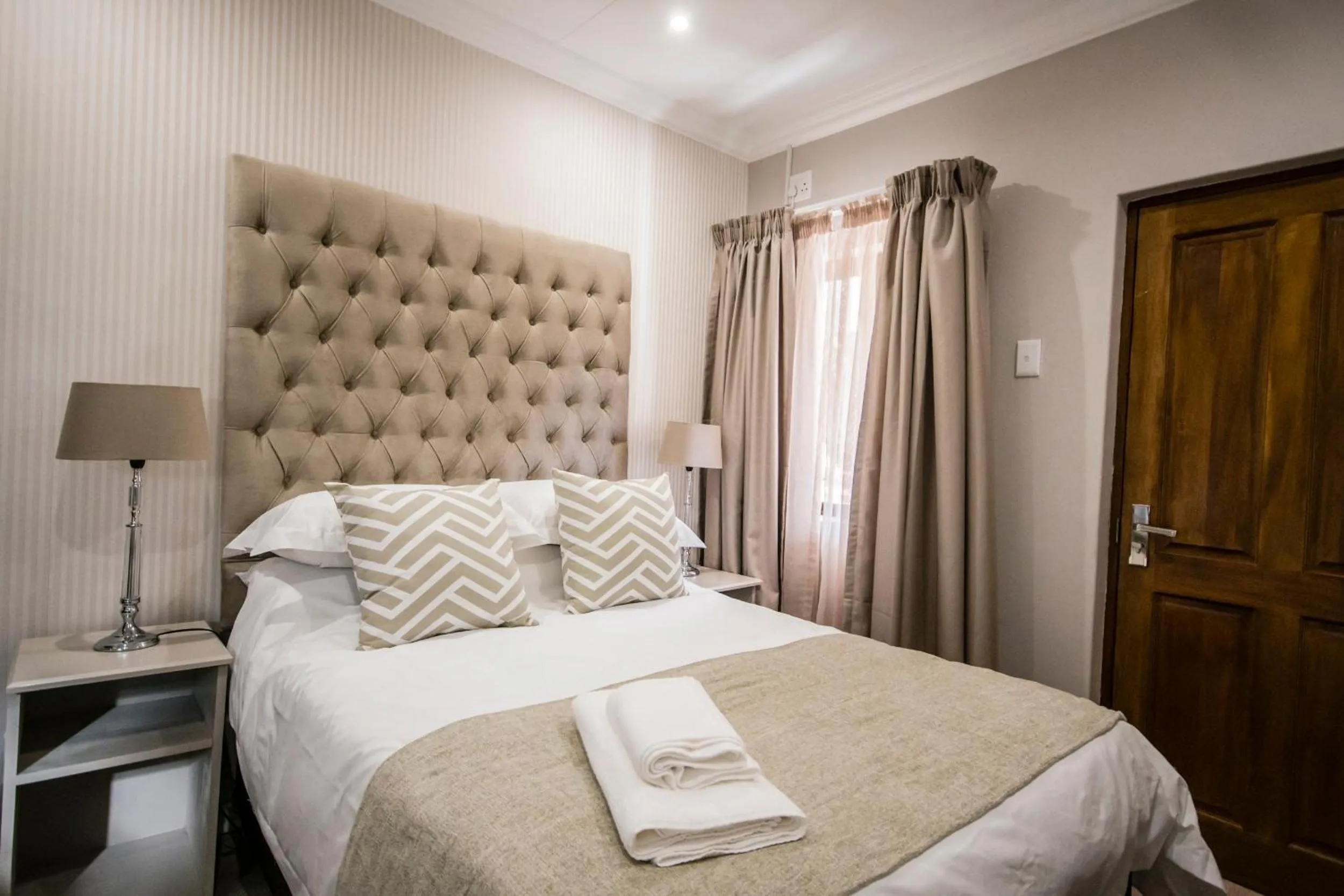 Bed in The Royal Guest House