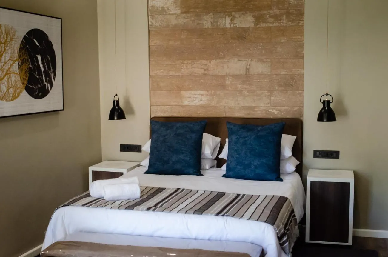 Bed in The Royal Guest House