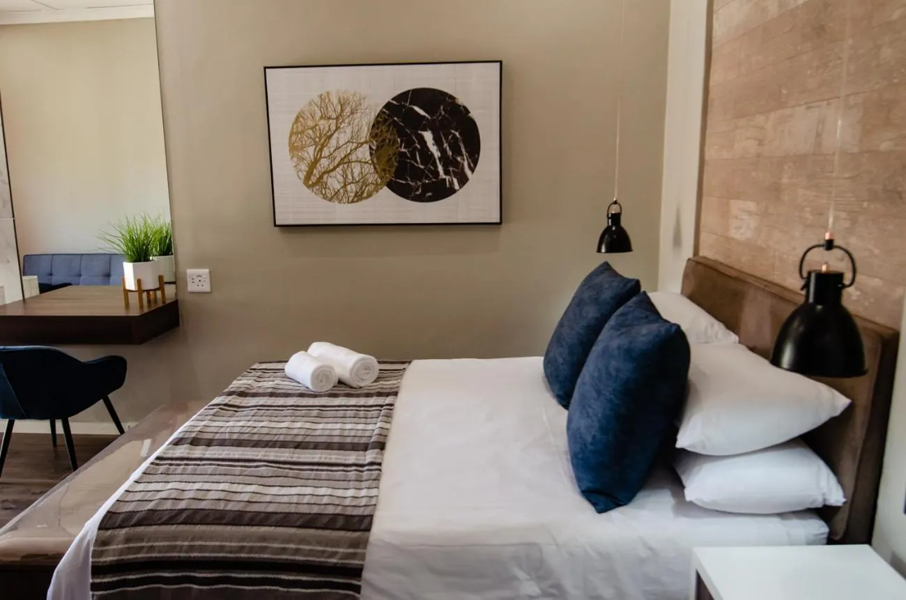 Bed in The Royal Guest House