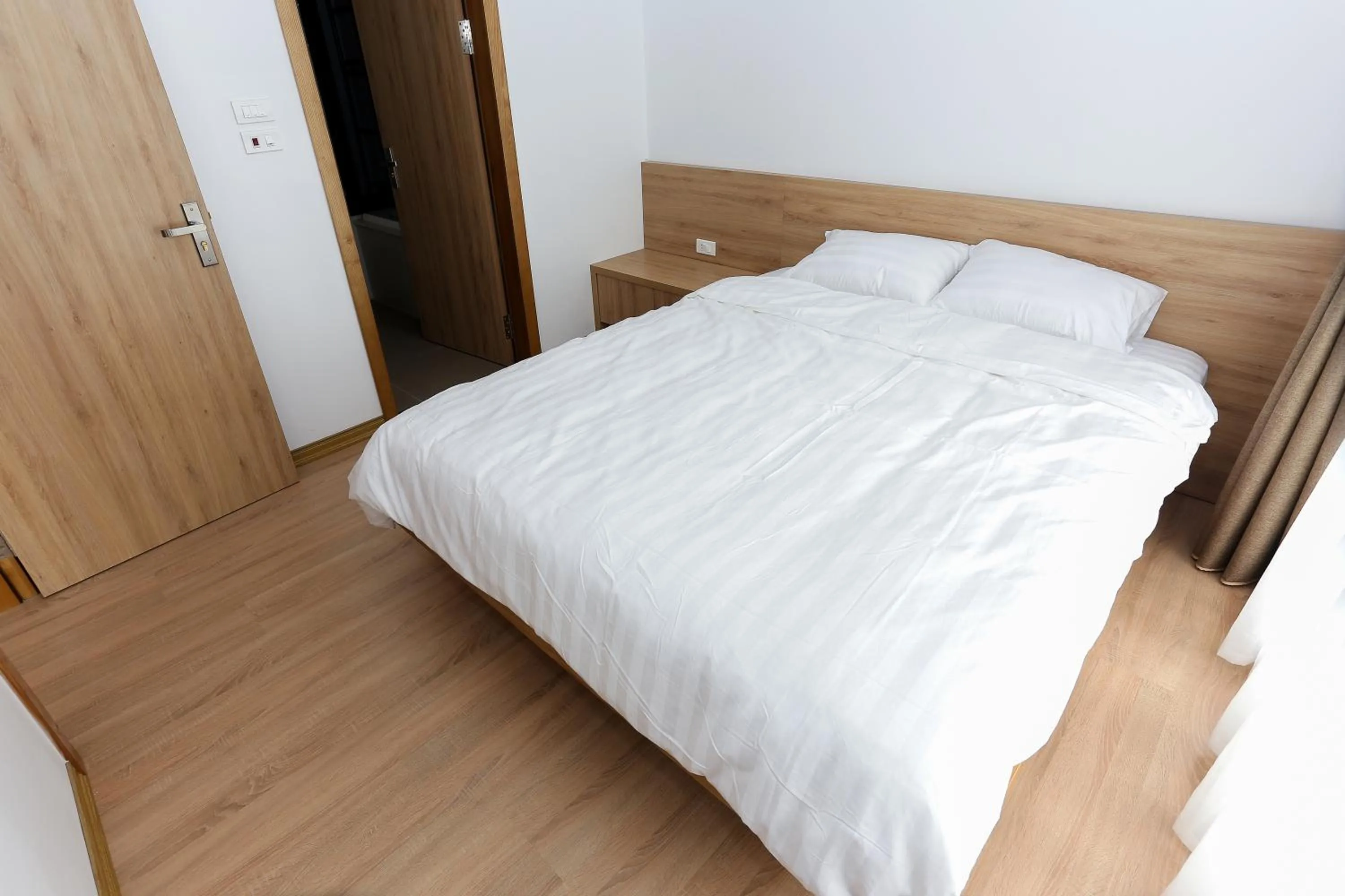 Bed in Quiet Hoang Quoc Viet Hotel & apartment