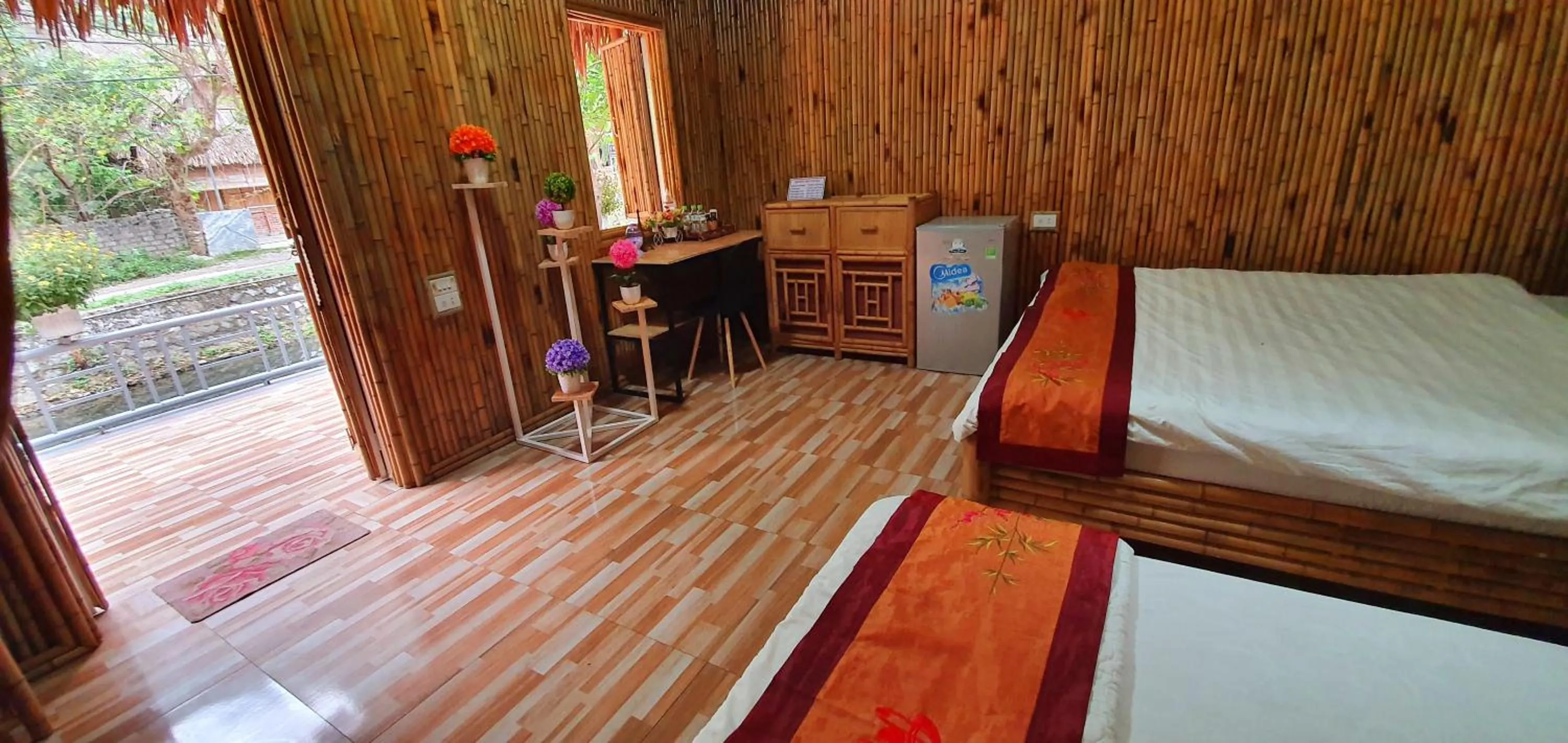 Photo of the whole room in Quoc Khanh Bamboo Homestay