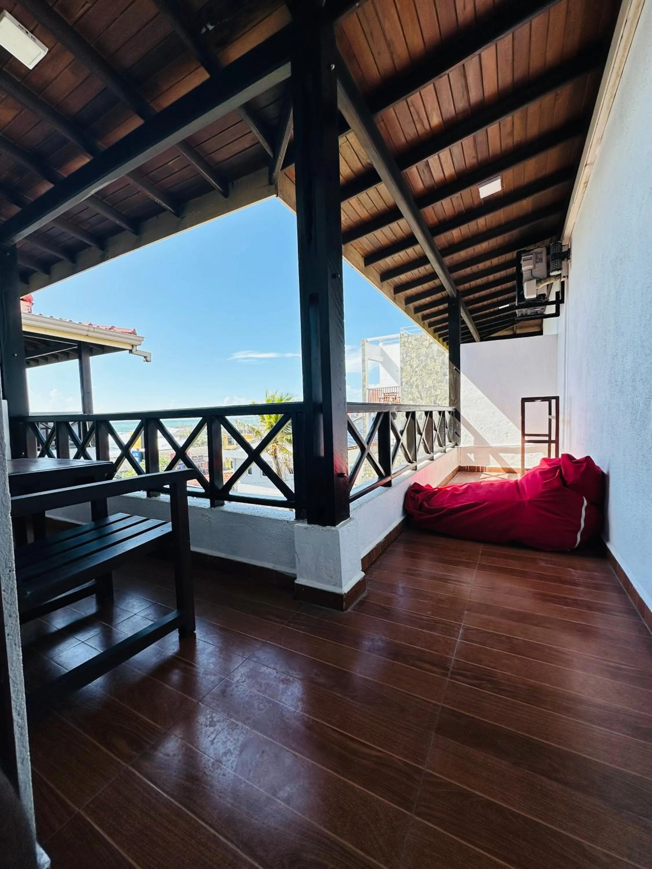 Property building, Bed in Cozy Sea view Inn