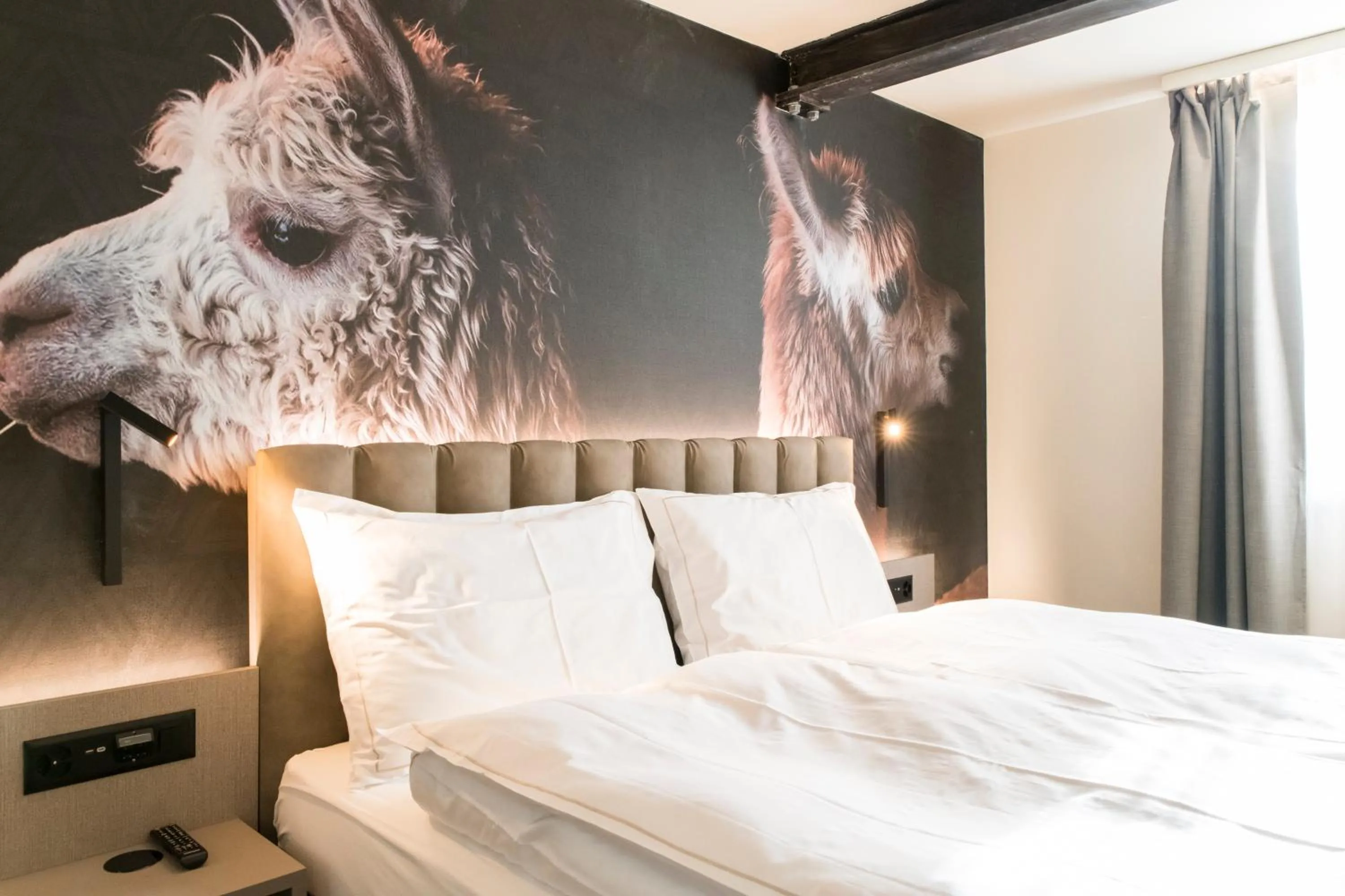 Bed in Adaastra Boutique Hotel