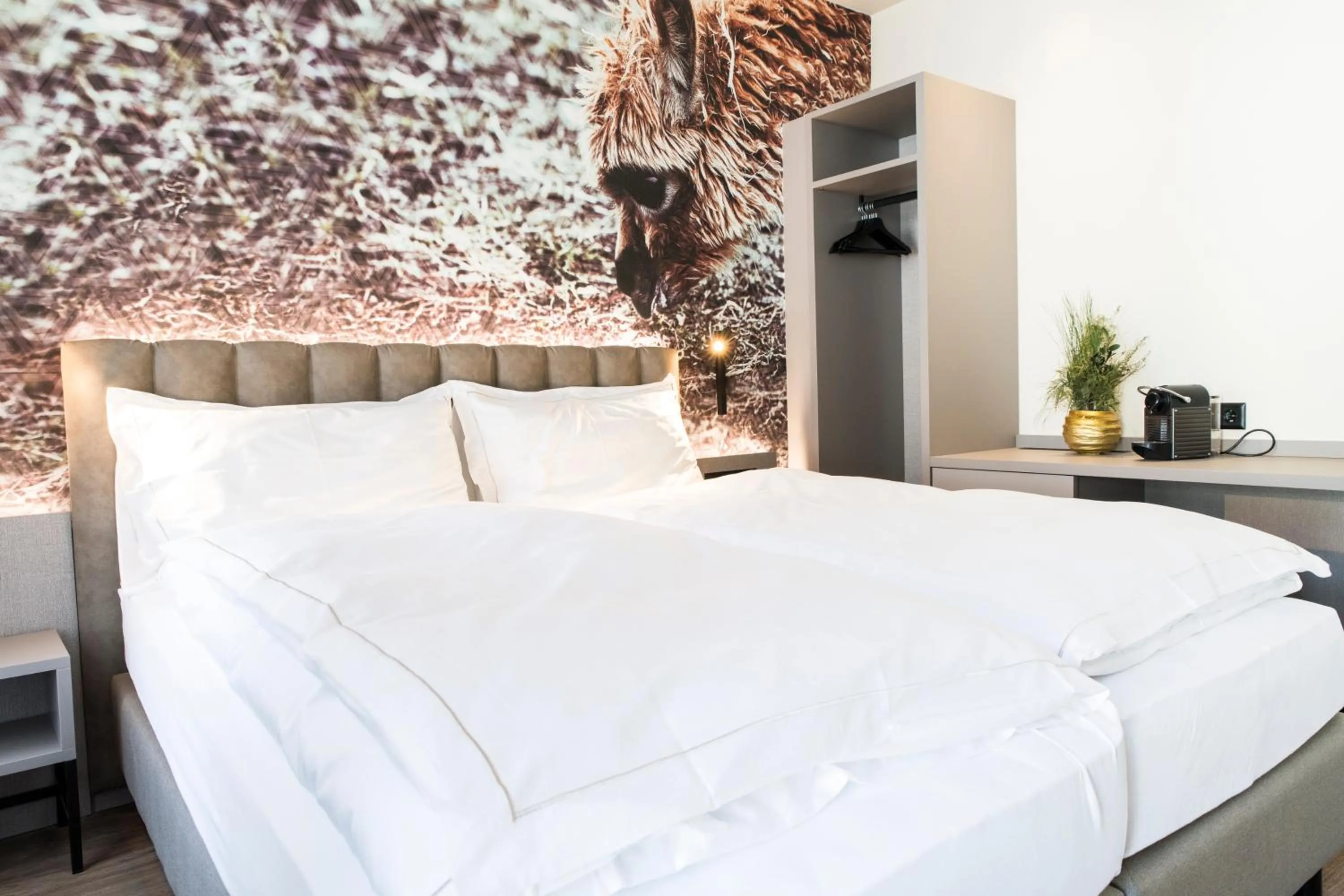 Bed in Adaastra Boutique Hotel