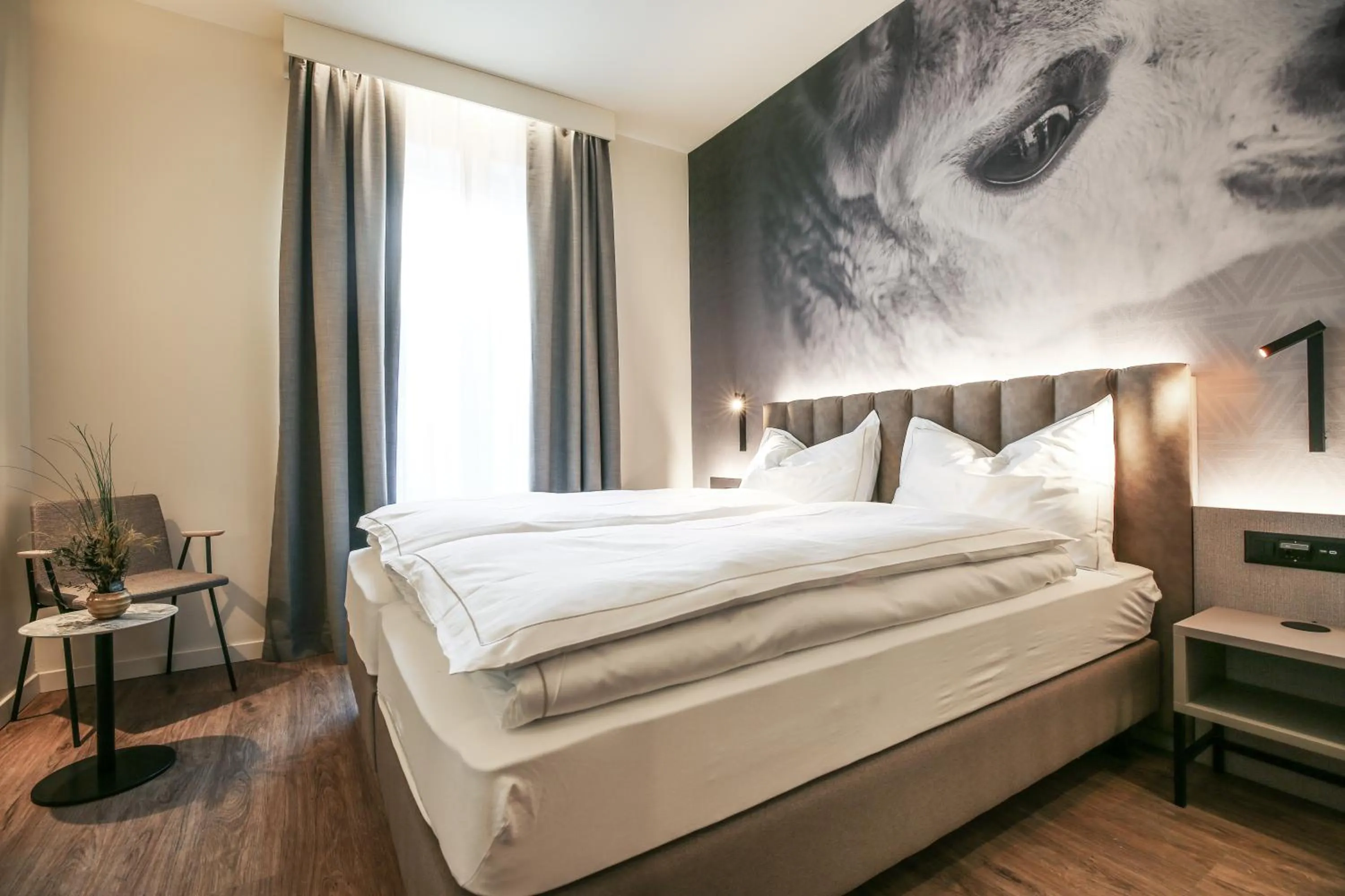 Bed in Adaastra Boutique Hotel