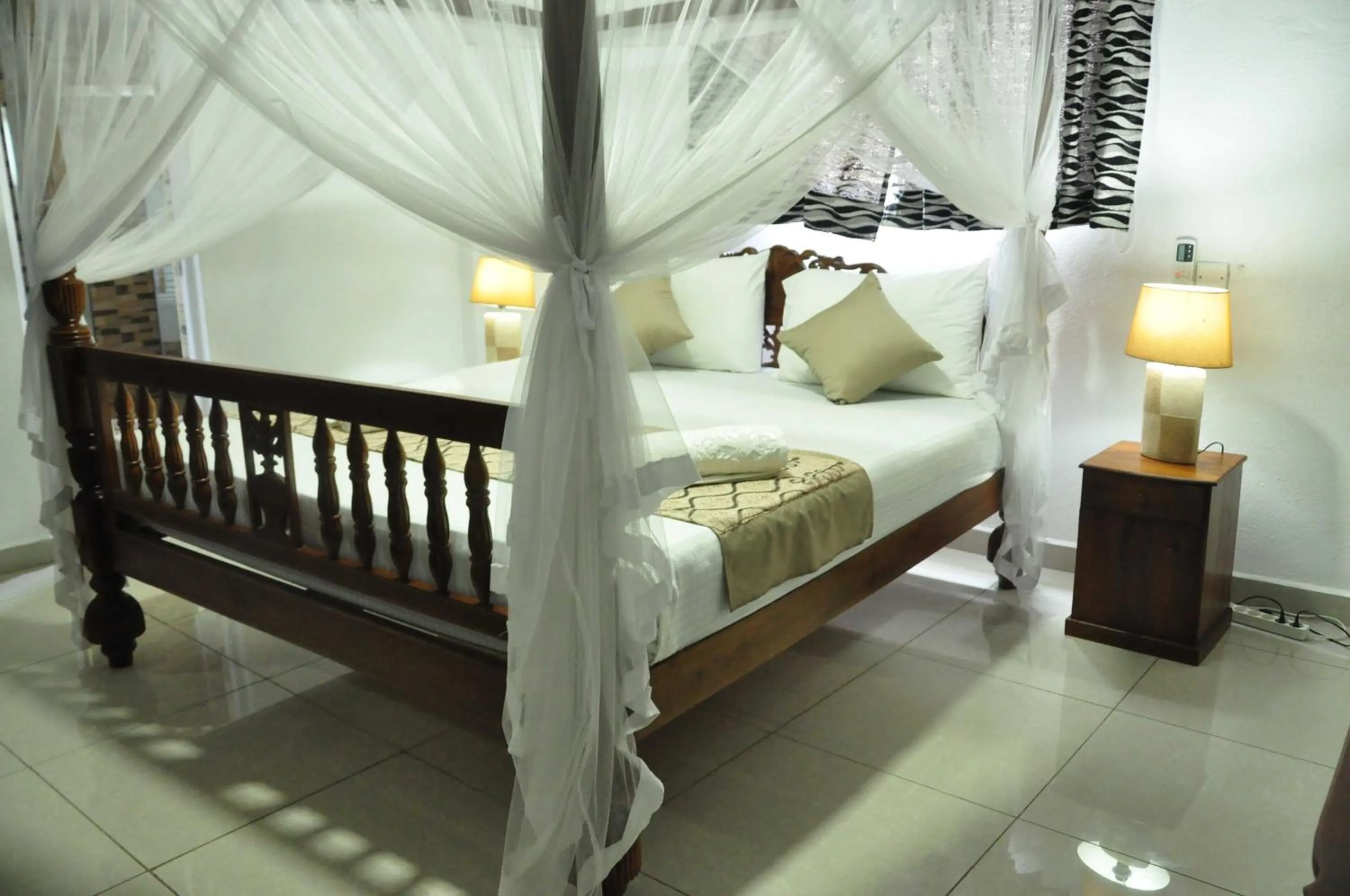 Bed in El Corazon De Hikkaduwa