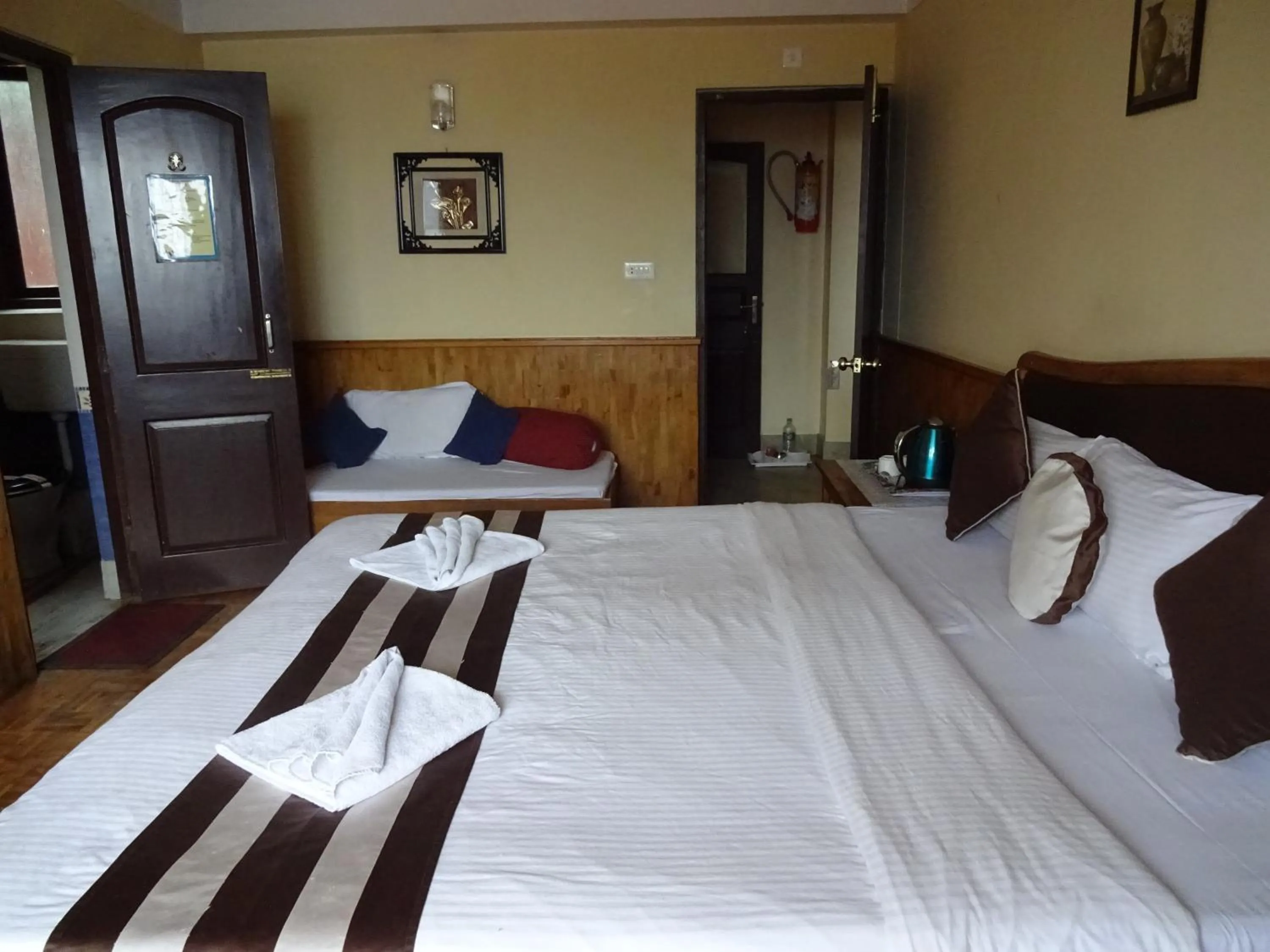 Bed in Jain Group Hotel Royal Residency