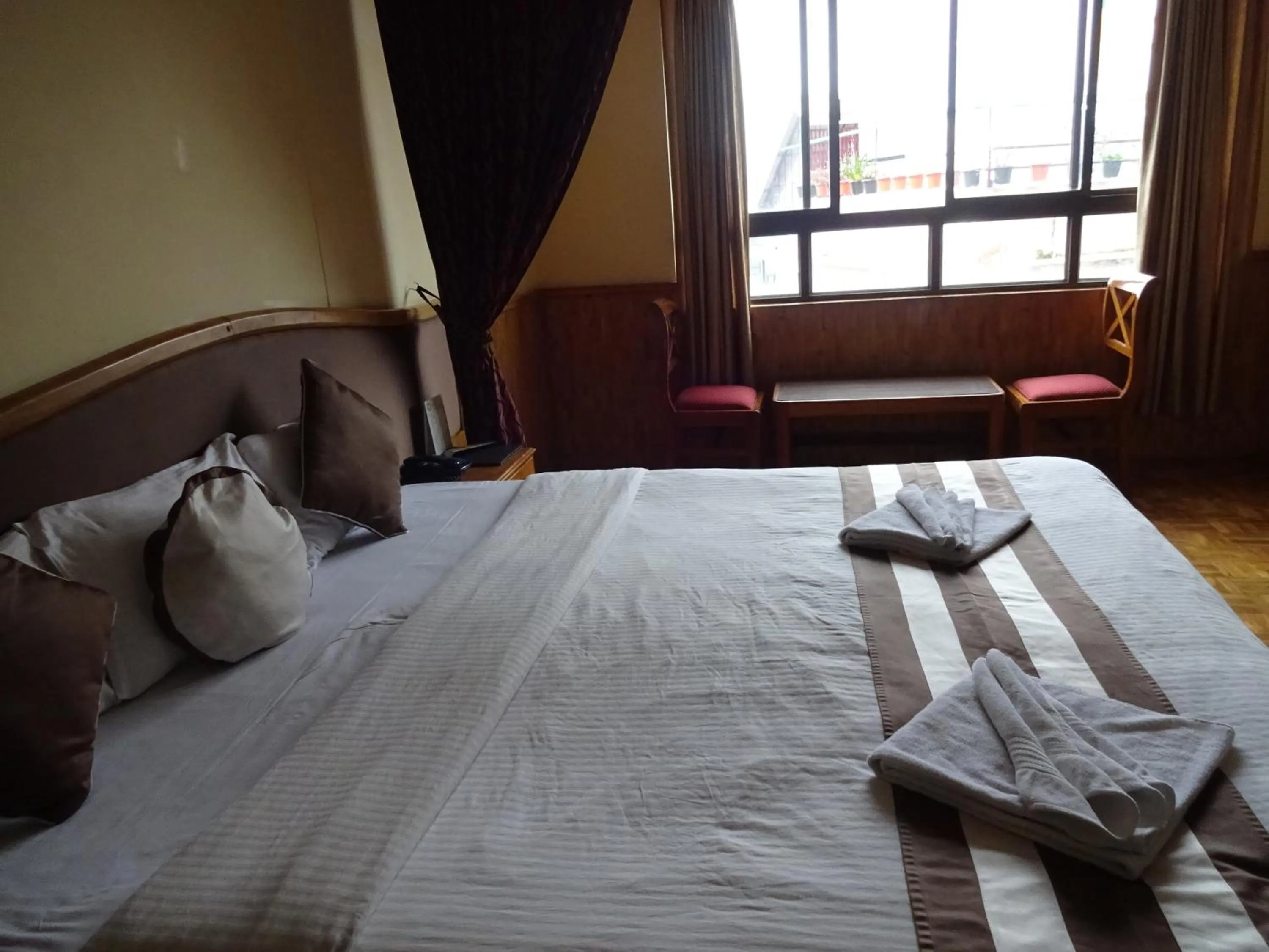 Bed in Jain Group Hotel Royal Residency