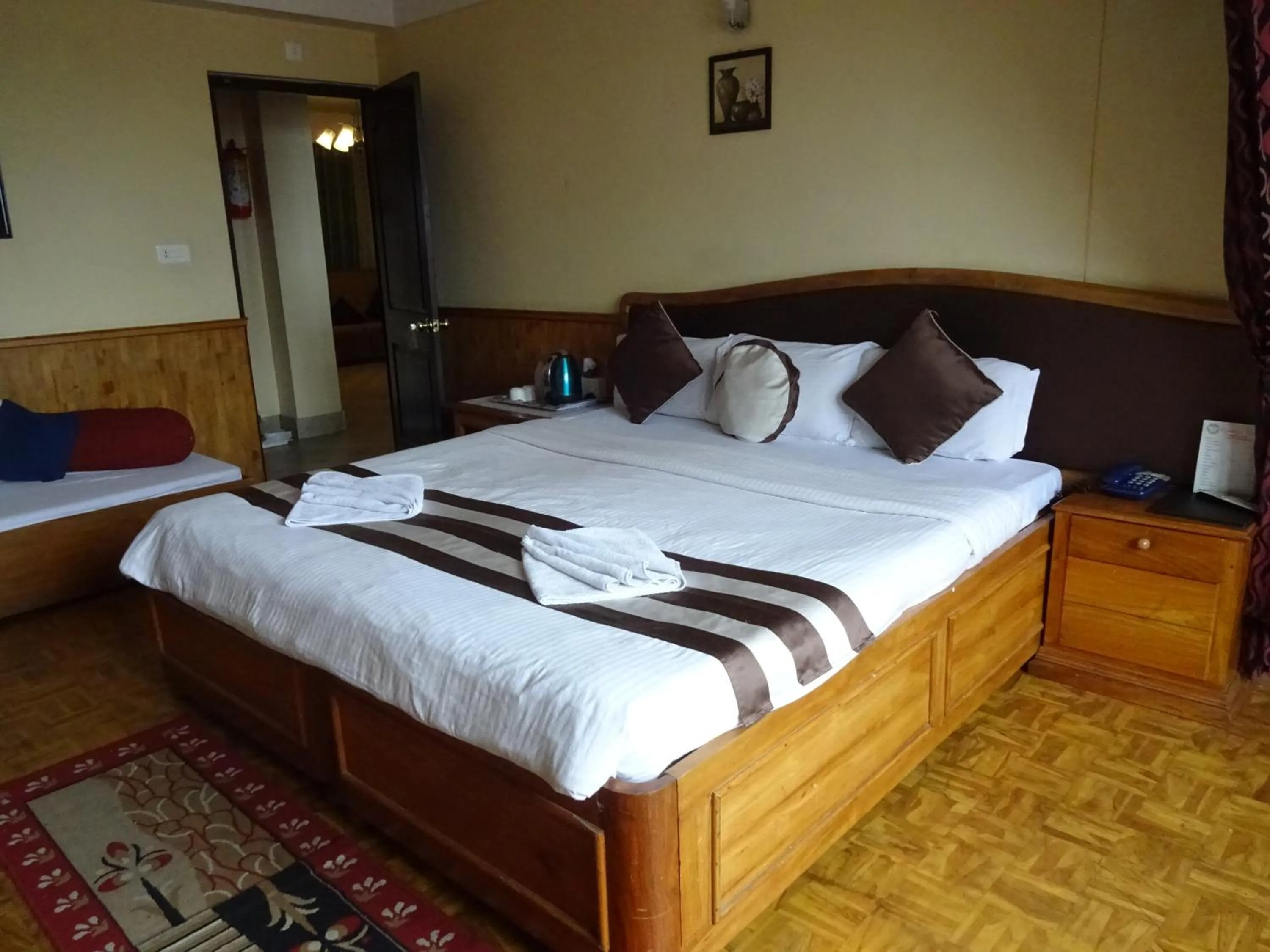 Bed in Jain Group Hotel Royal Residency