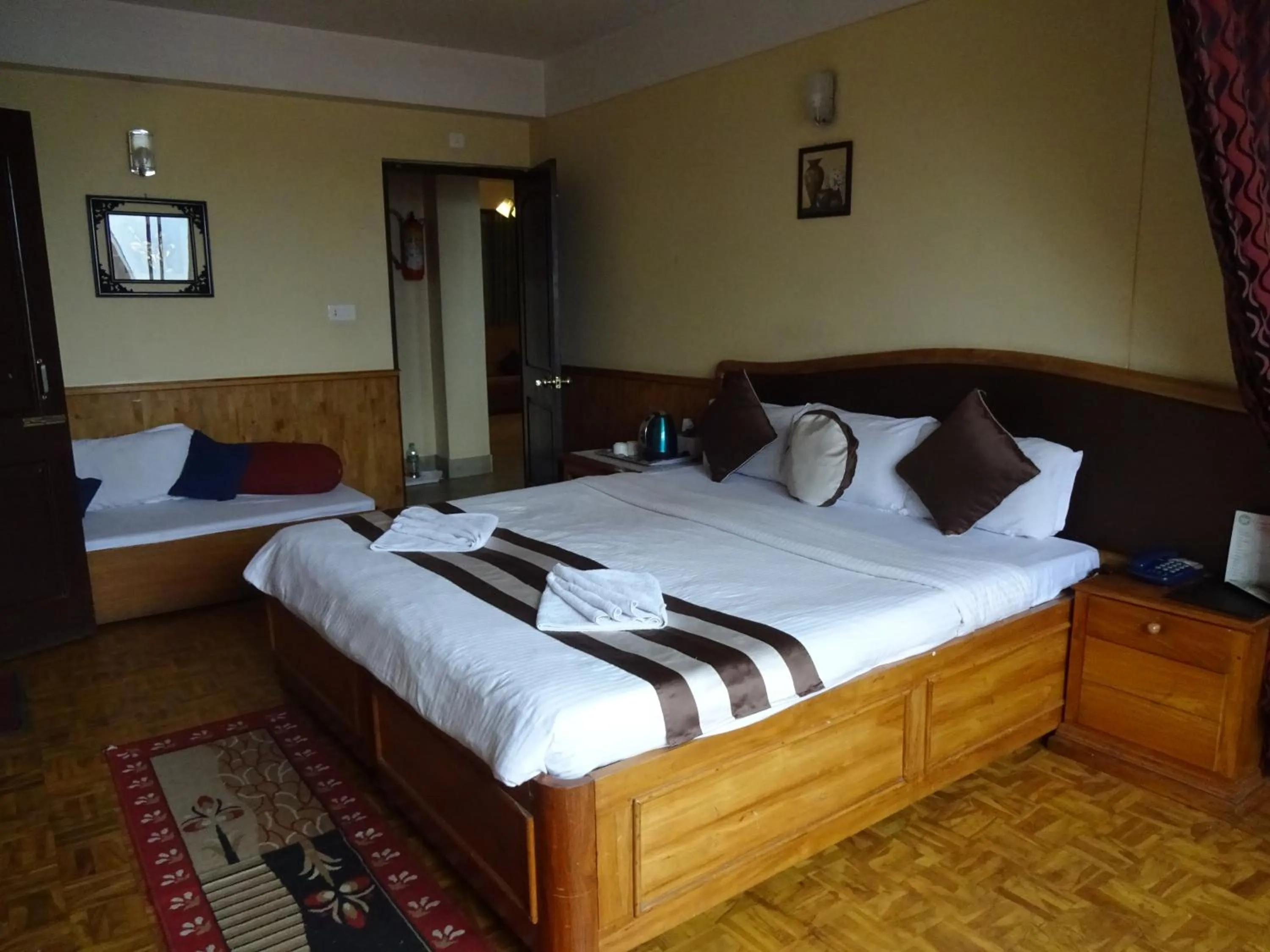 Bed in Jain Group Hotel Royal Residency