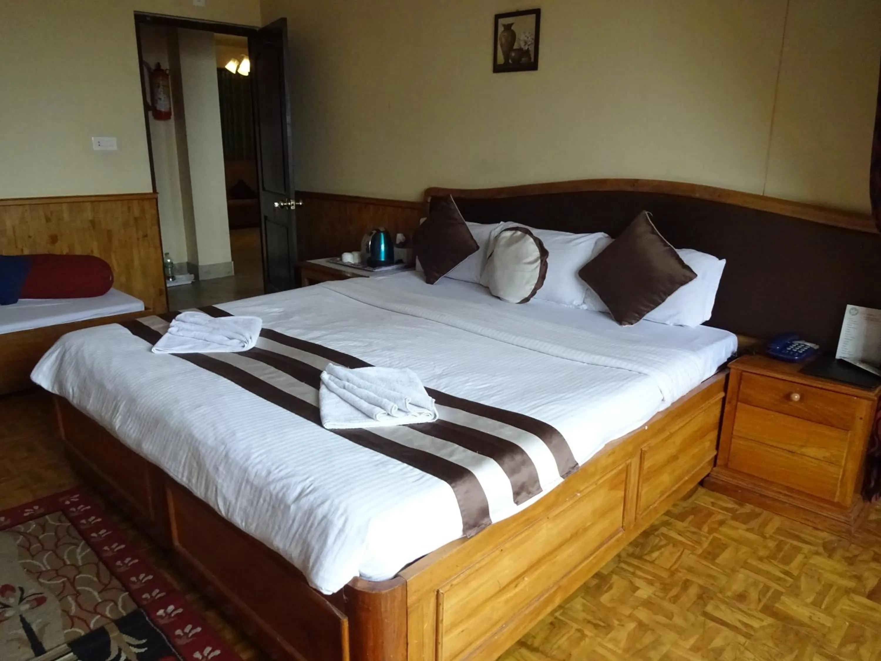 Bed in Jain Group Hotel Royal Residency