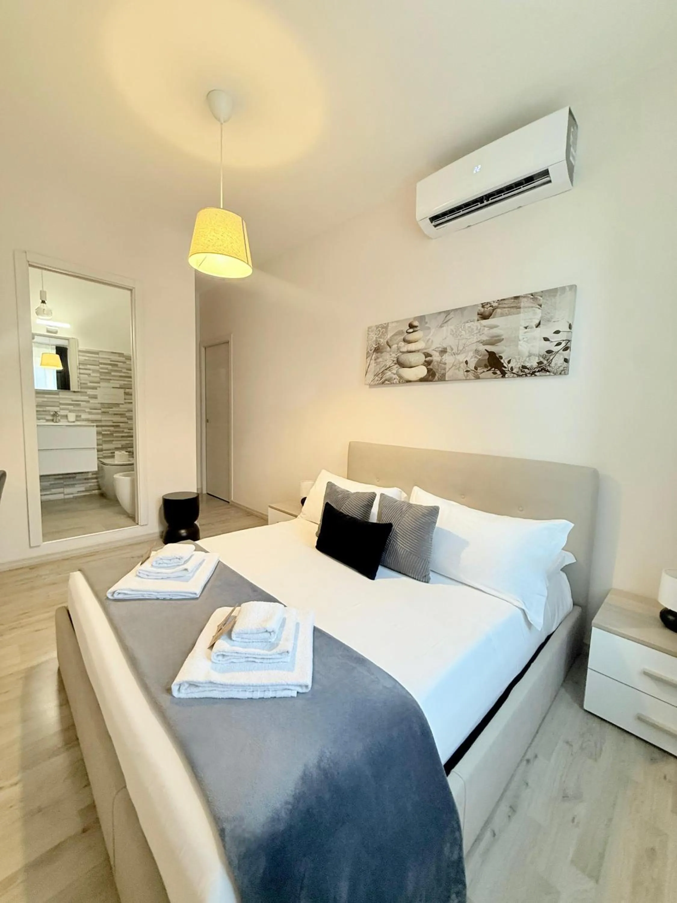 Bed in San Pietro Rooms 84