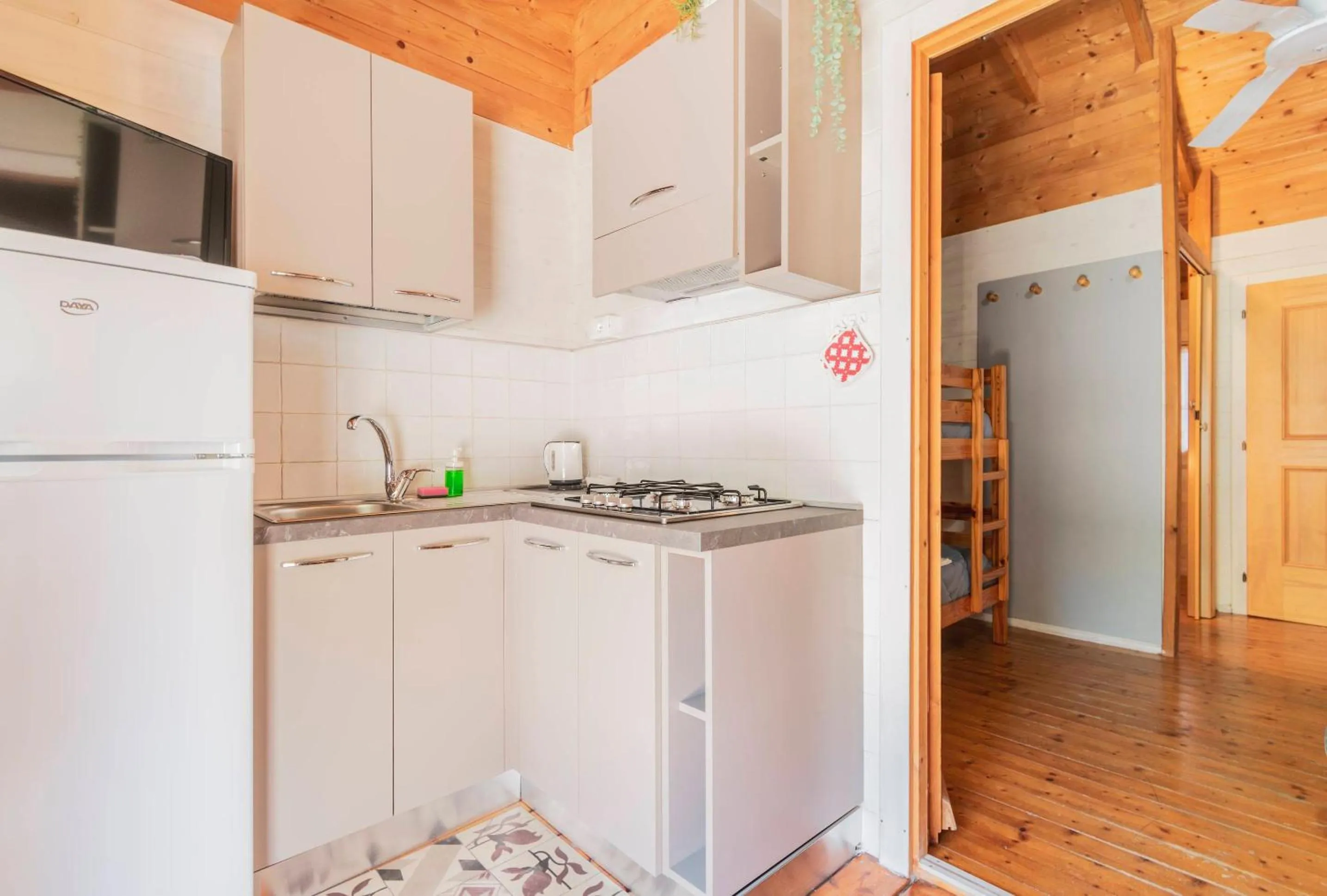 Kitchen or kitchenette in Camping OASI
