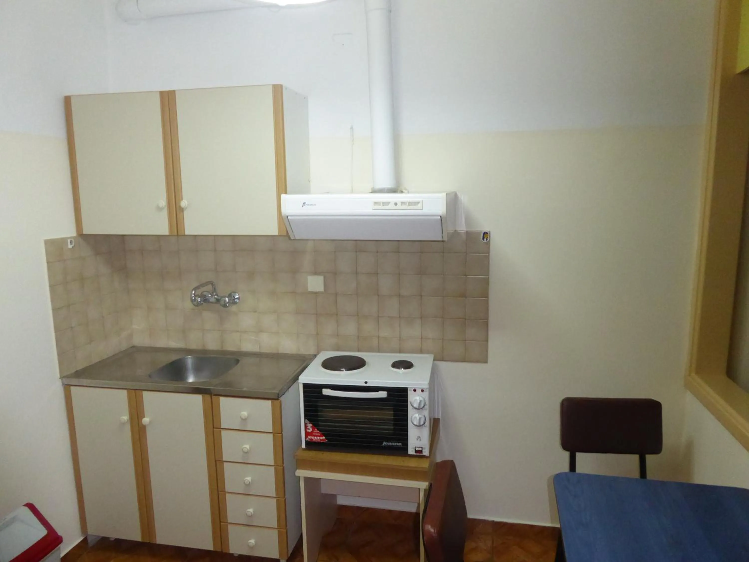 Kitchen or kitchenette in Poseidon Hotel