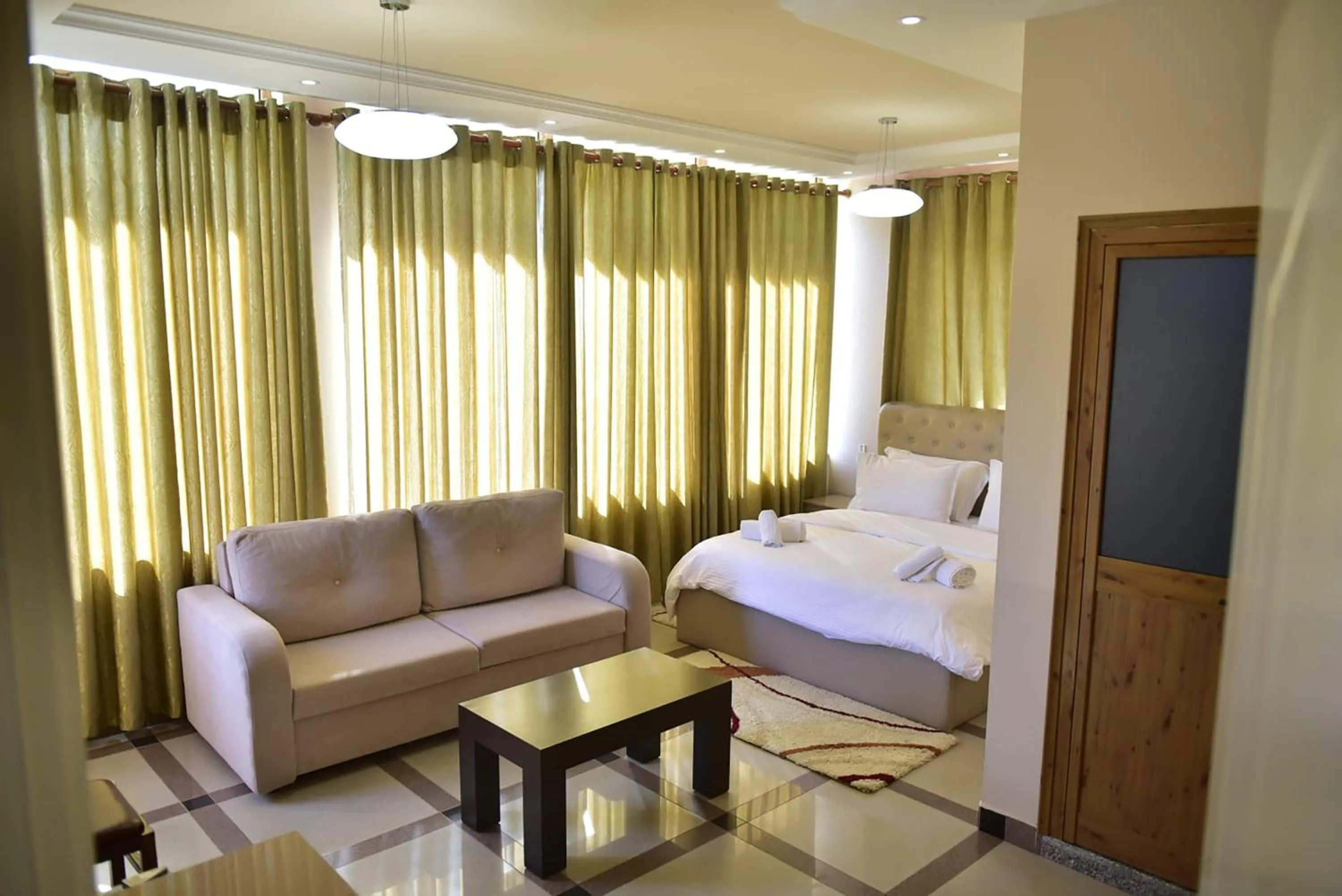 Photo of the whole room, Bed in Buna Park Hotel