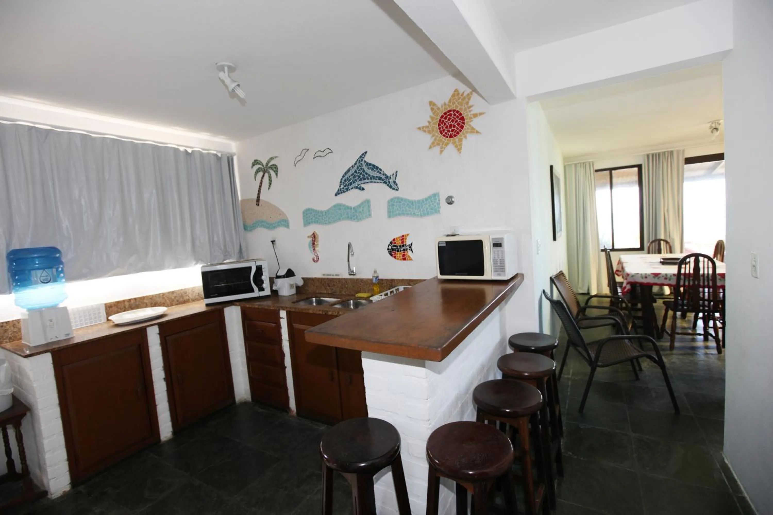 Kitchen or kitchenette in Pousada Hibisco