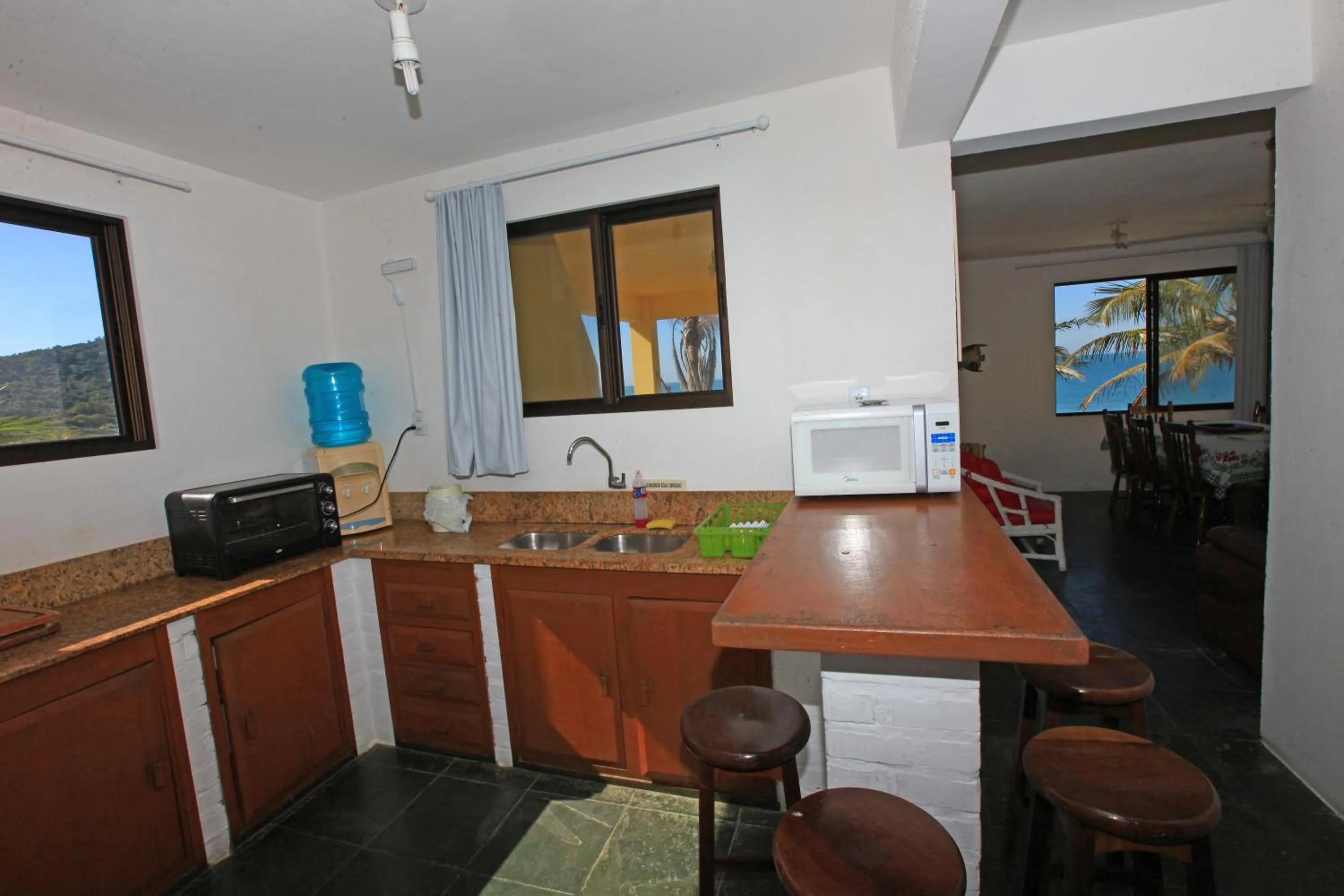 Kitchen or kitchenette in Pousada Hibisco
