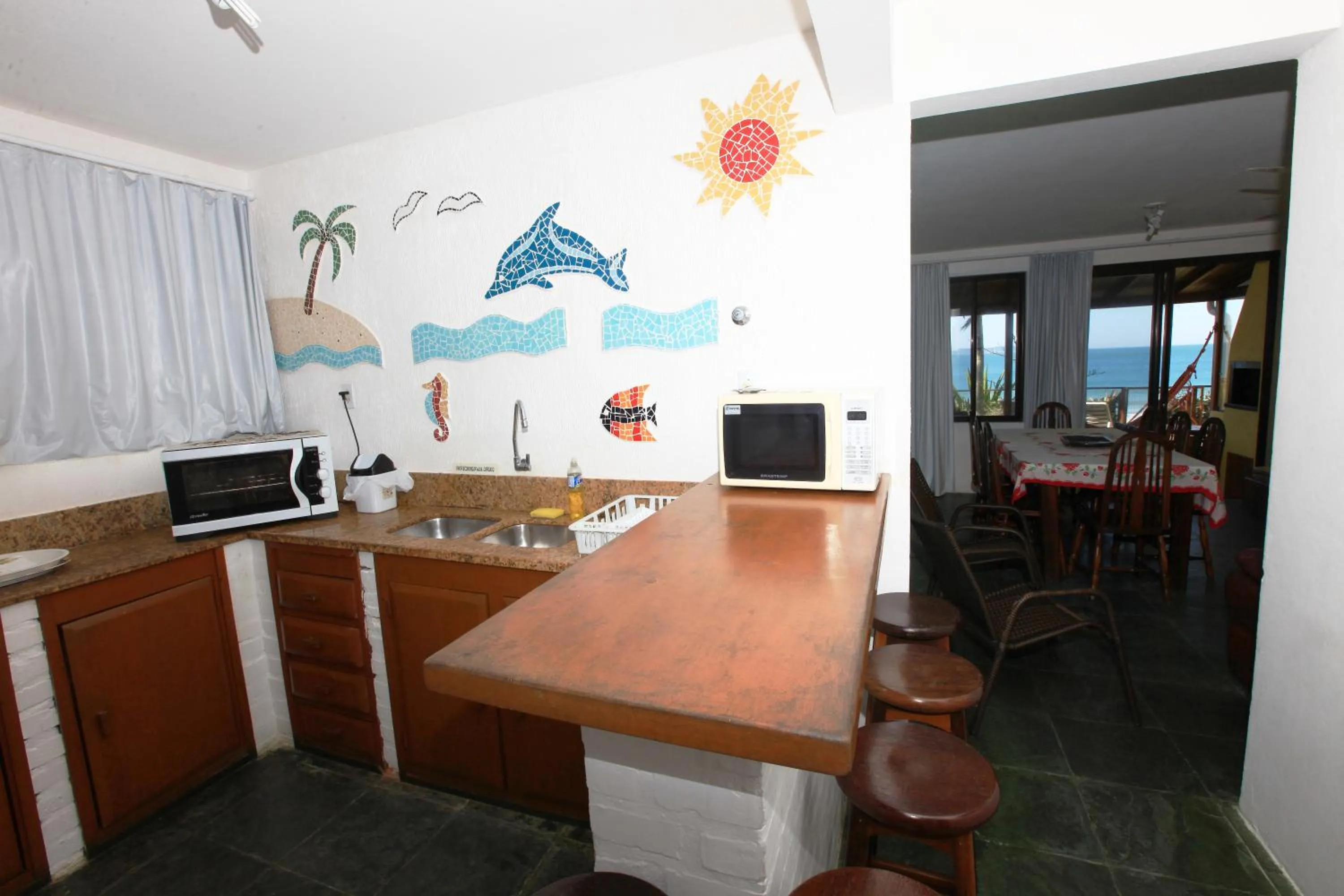 Kitchen or kitchenette in Pousada Hibisco