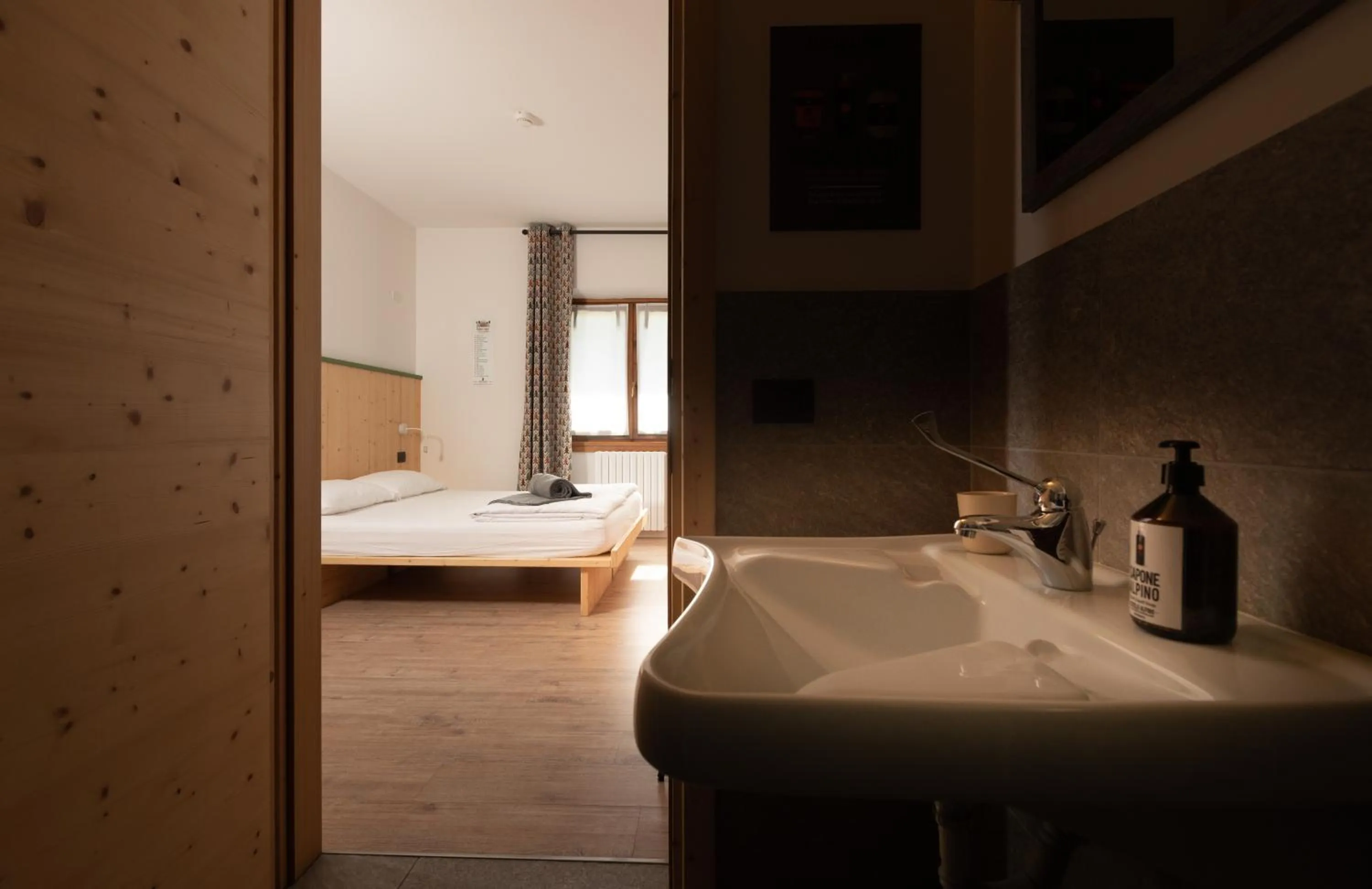 Photo of the whole room, Bed in Ostello Alpino