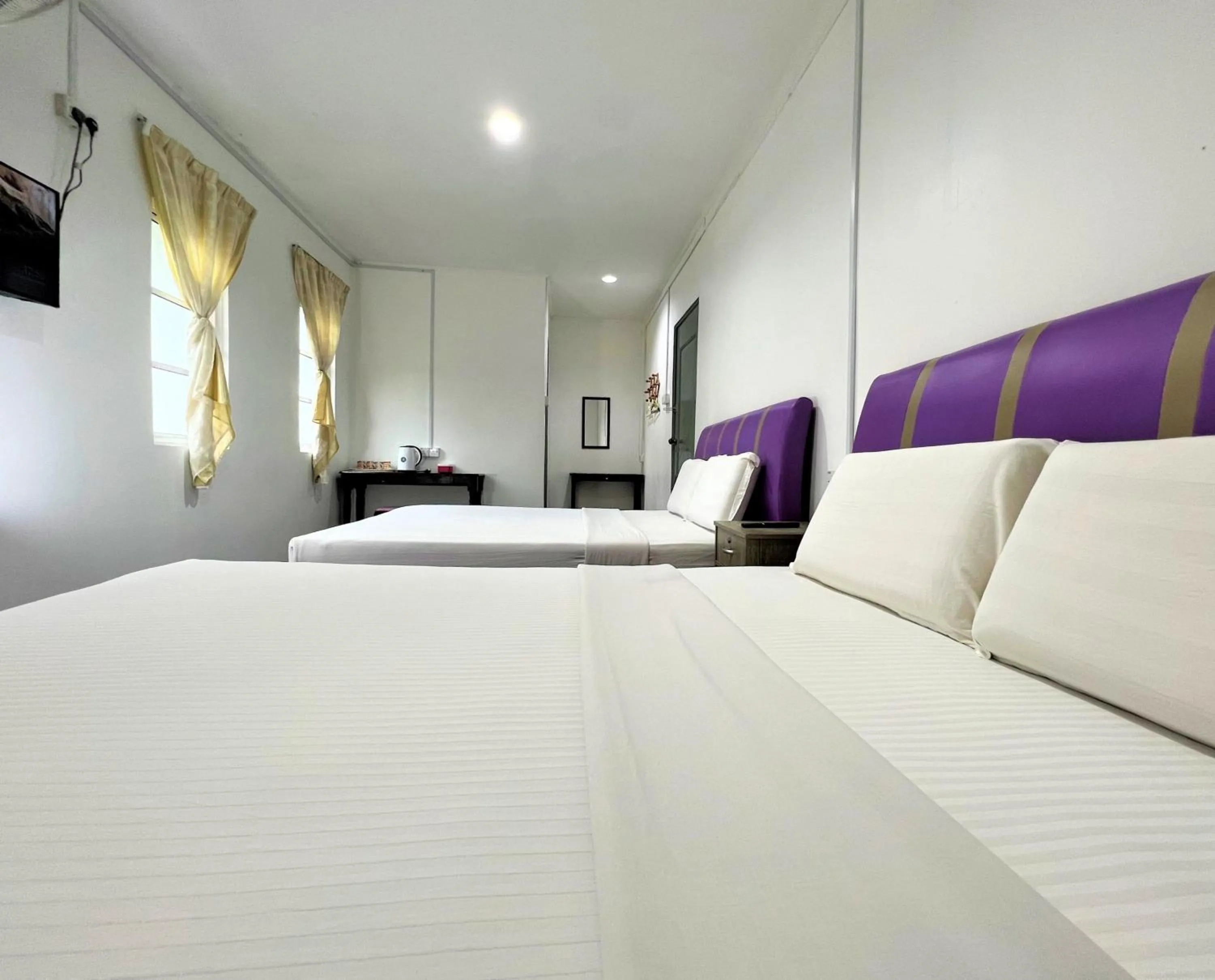 Bed in Suang Noh Homestay Kundasang