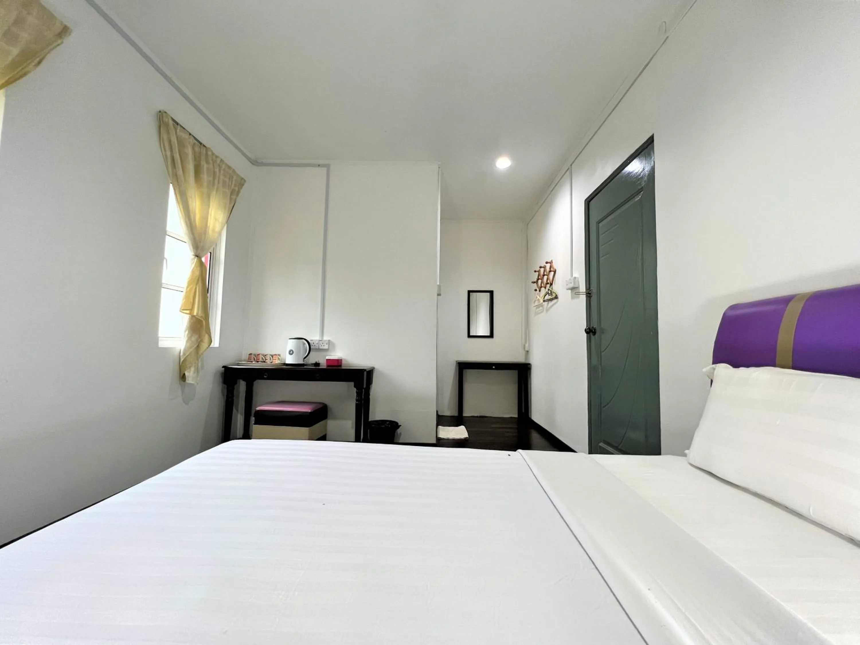 Bed in Suang Noh Homestay Kundasang