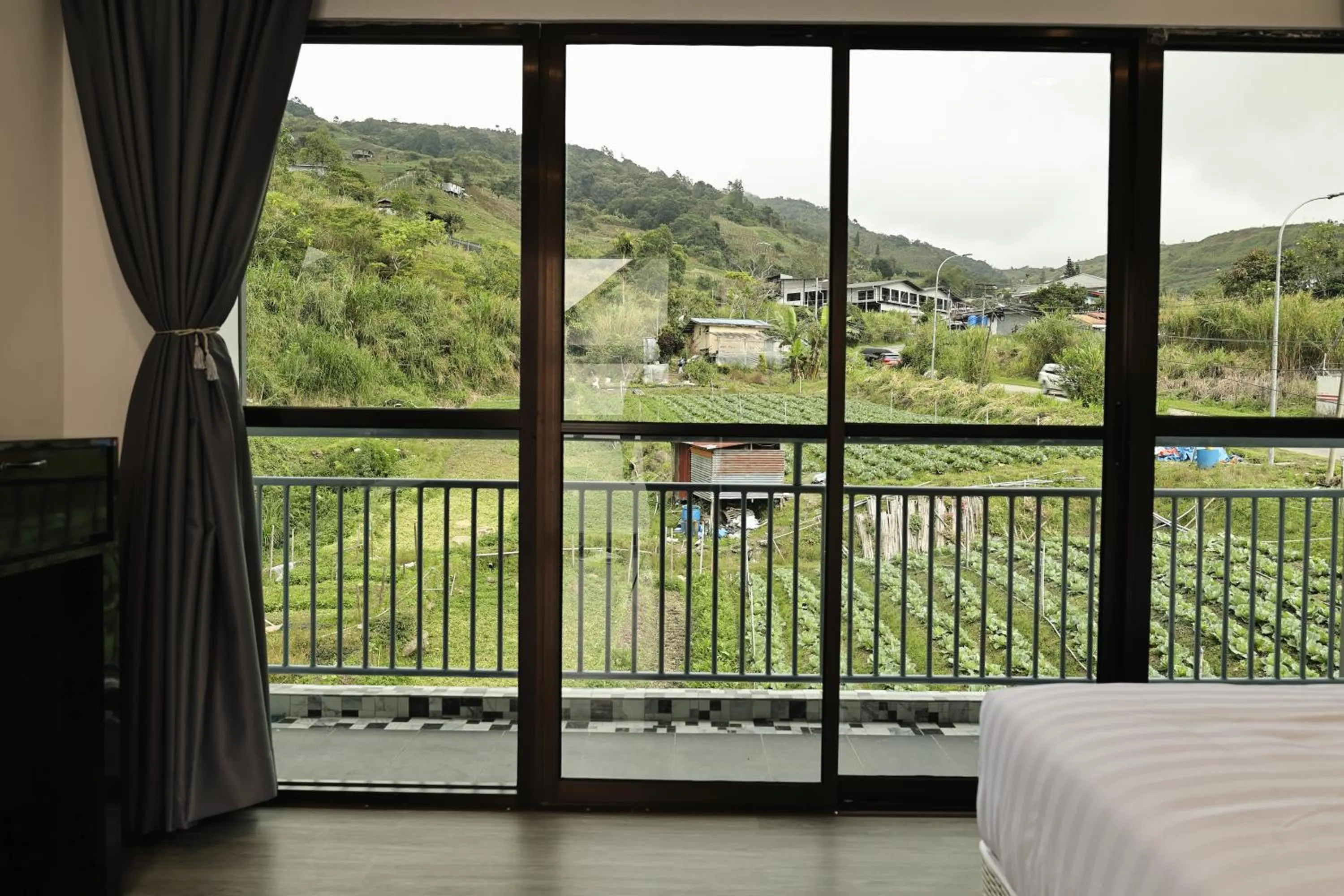 Bed in Suang Noh Homestay Kundasang