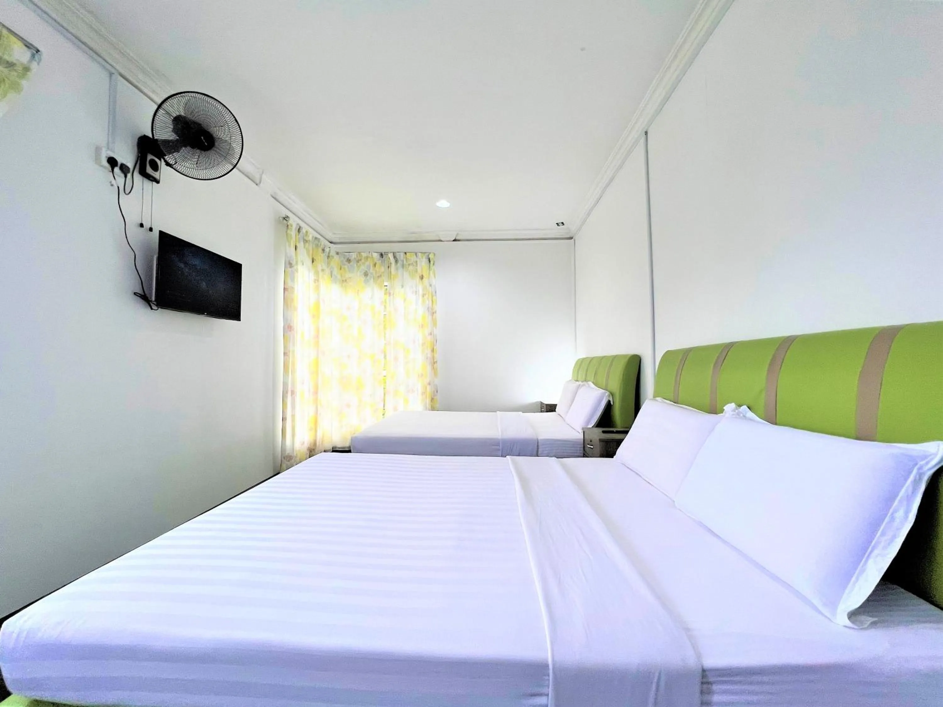 Bed in Suang Noh Homestay Kundasang