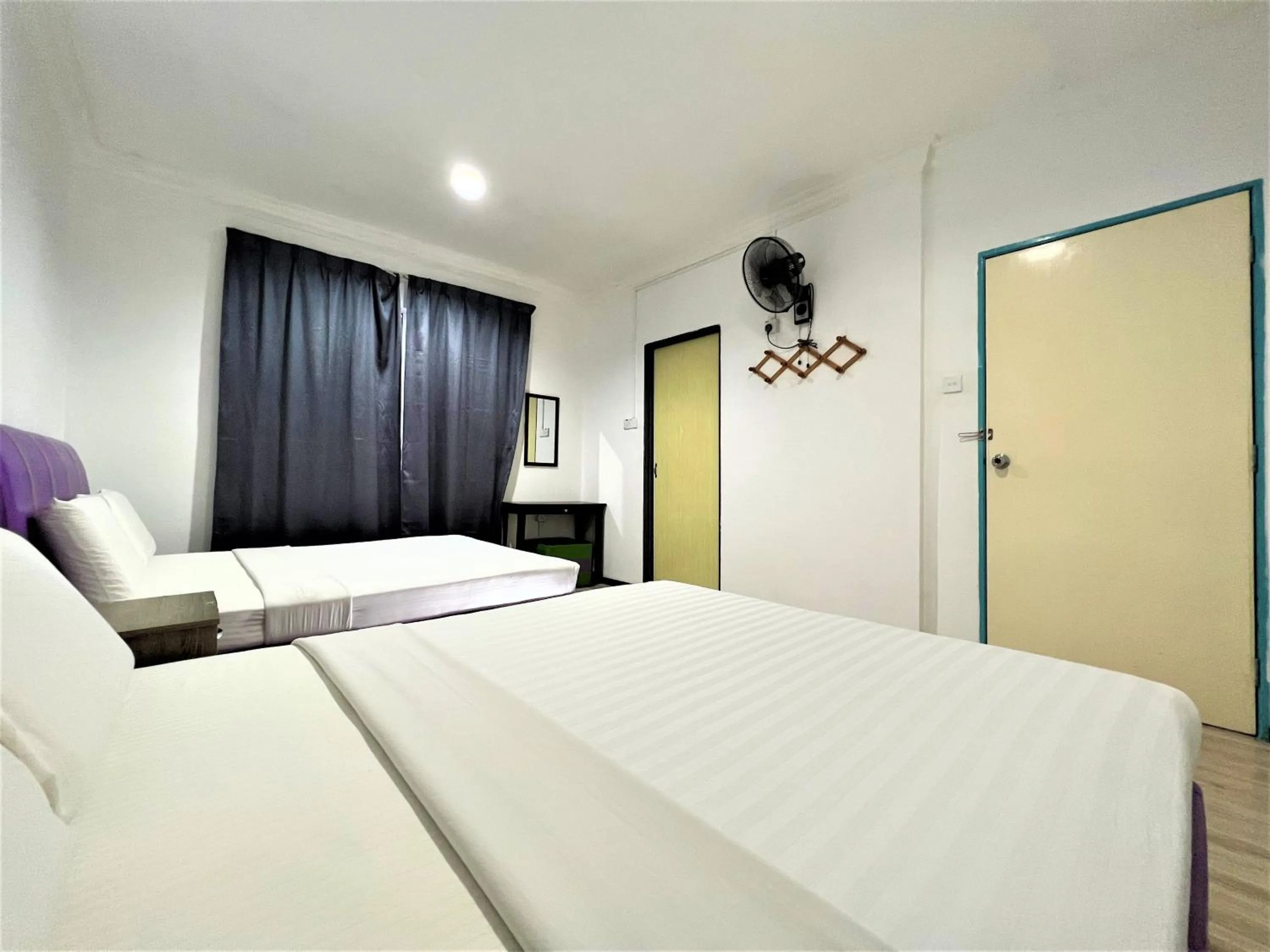 Bed in Suang Noh Homestay Kundasang