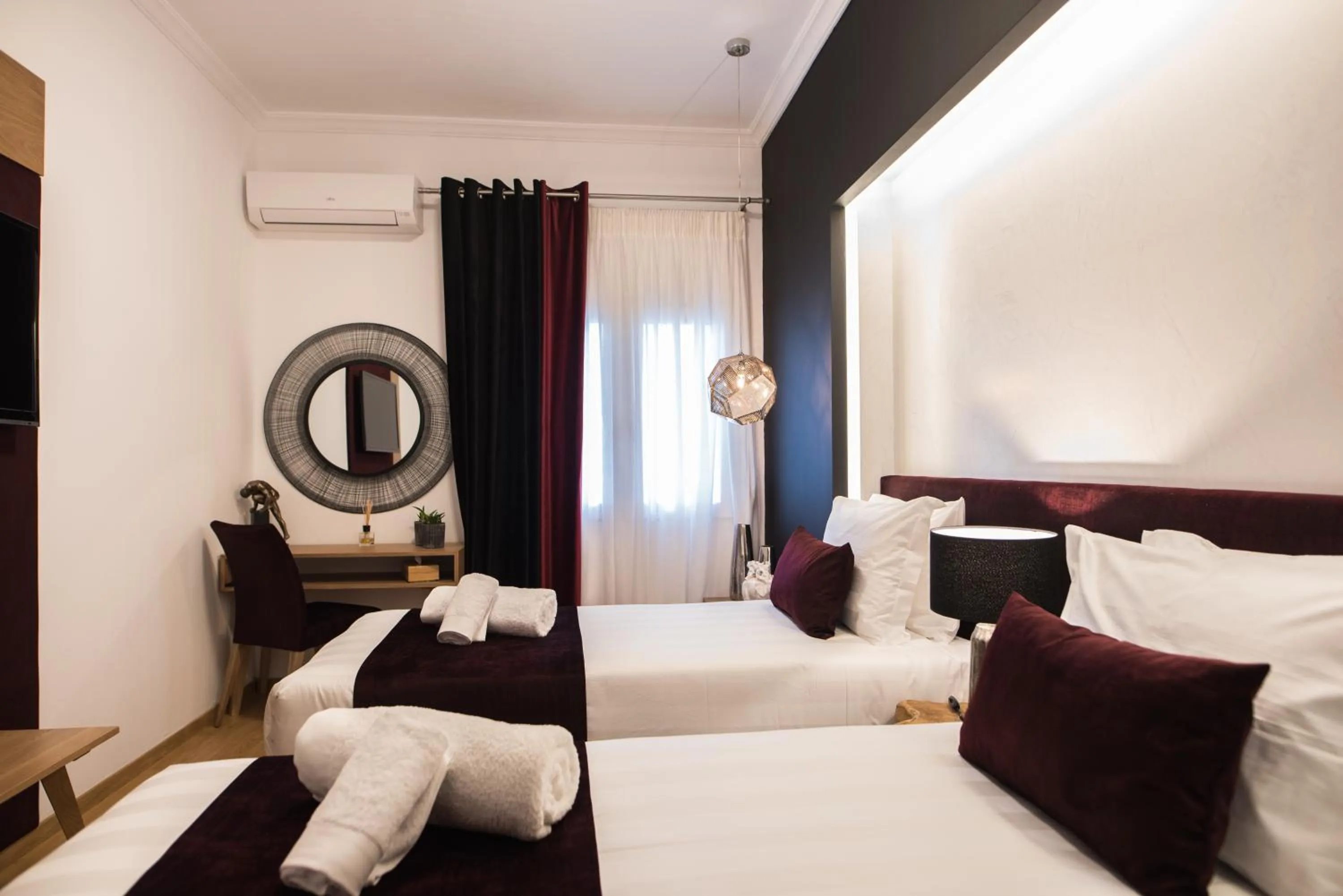 Bed in Acropolis View Deluxe Penthouse & Luxury Apartments