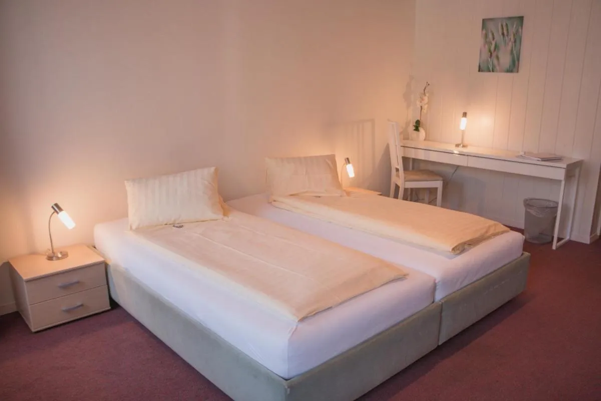 Photo of the whole room, Bed in Hotel Landhaus Adler