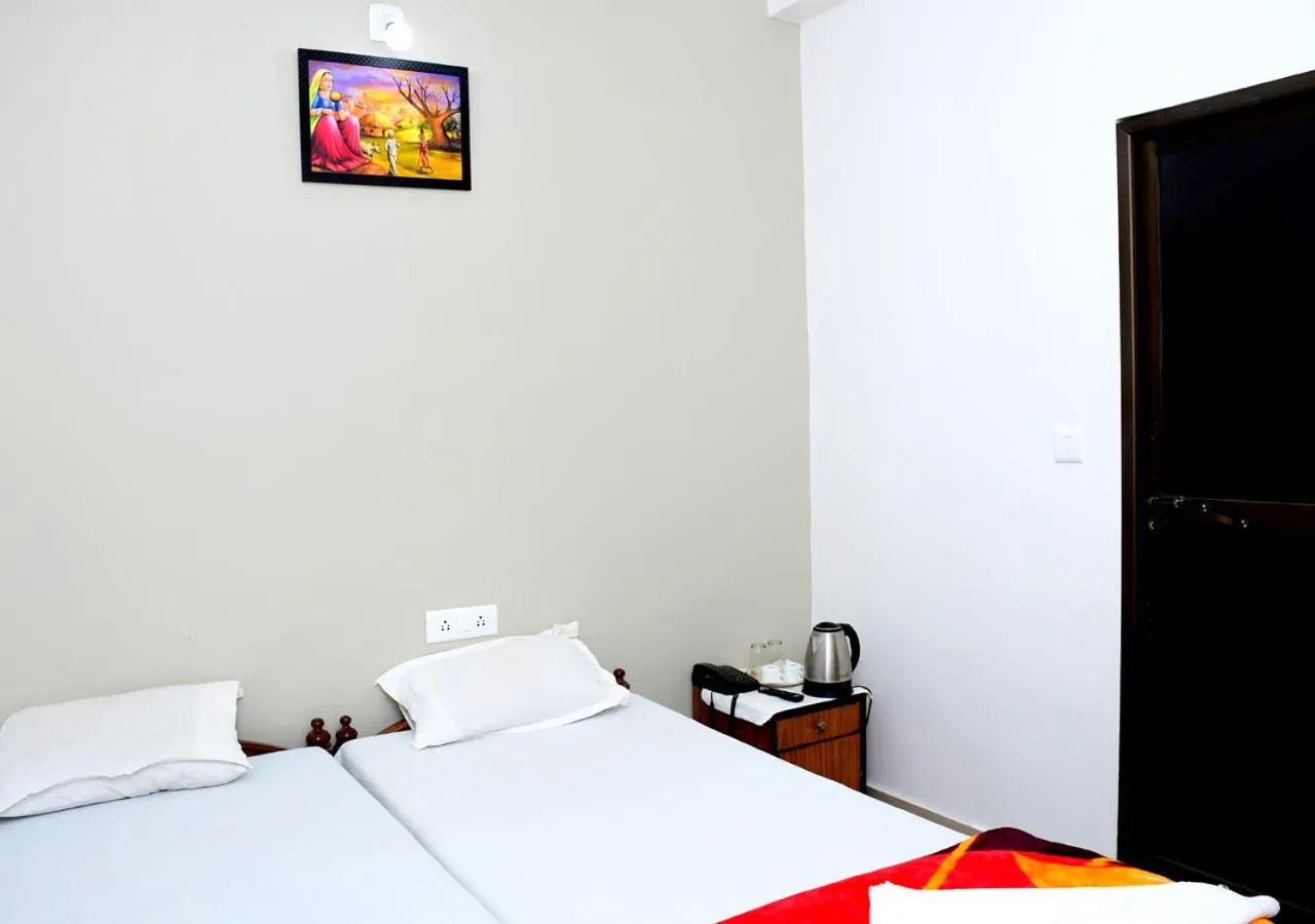 Bed in Satiya Guest House