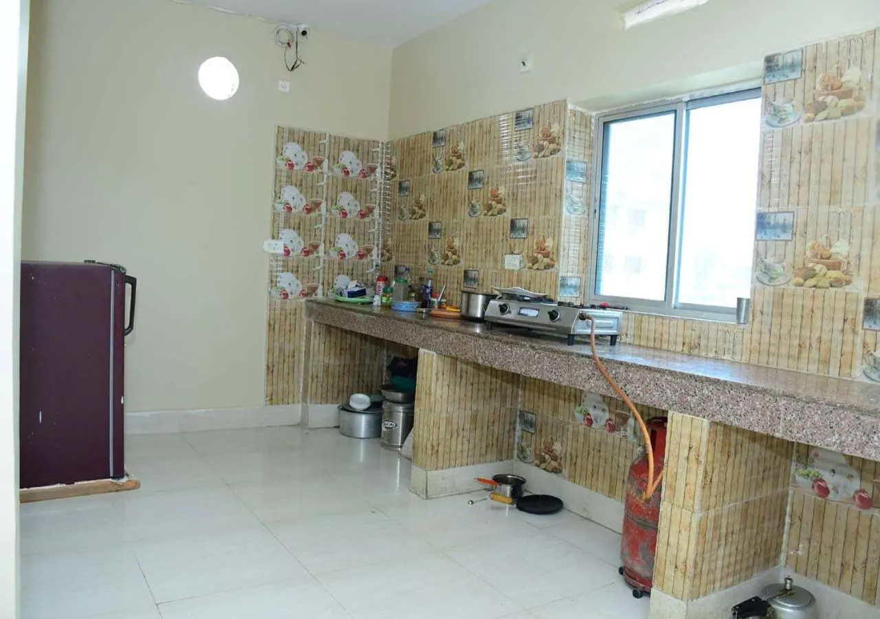 Kitchen or kitchenette in Satiya Guest House
