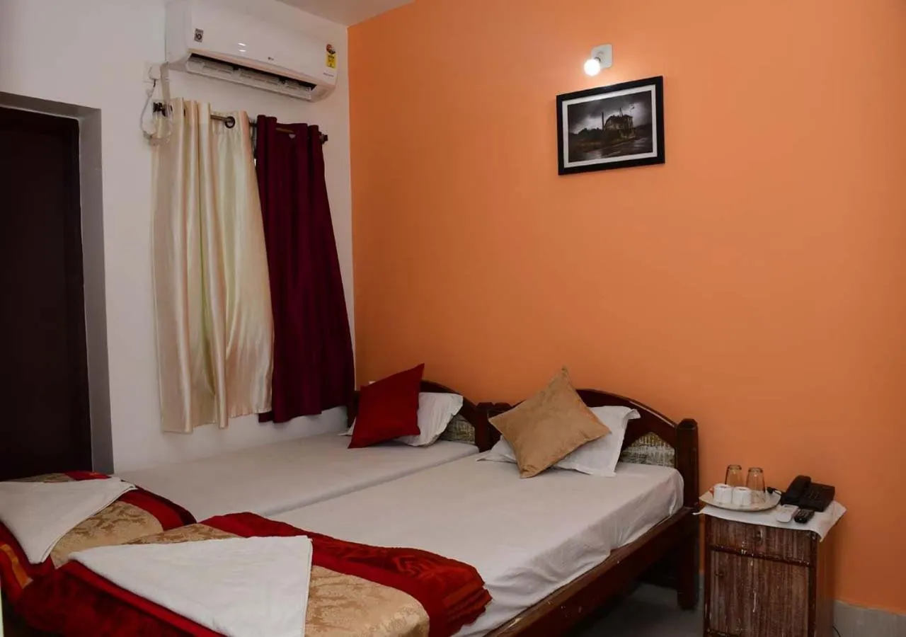 Bed in Satiya Guest House