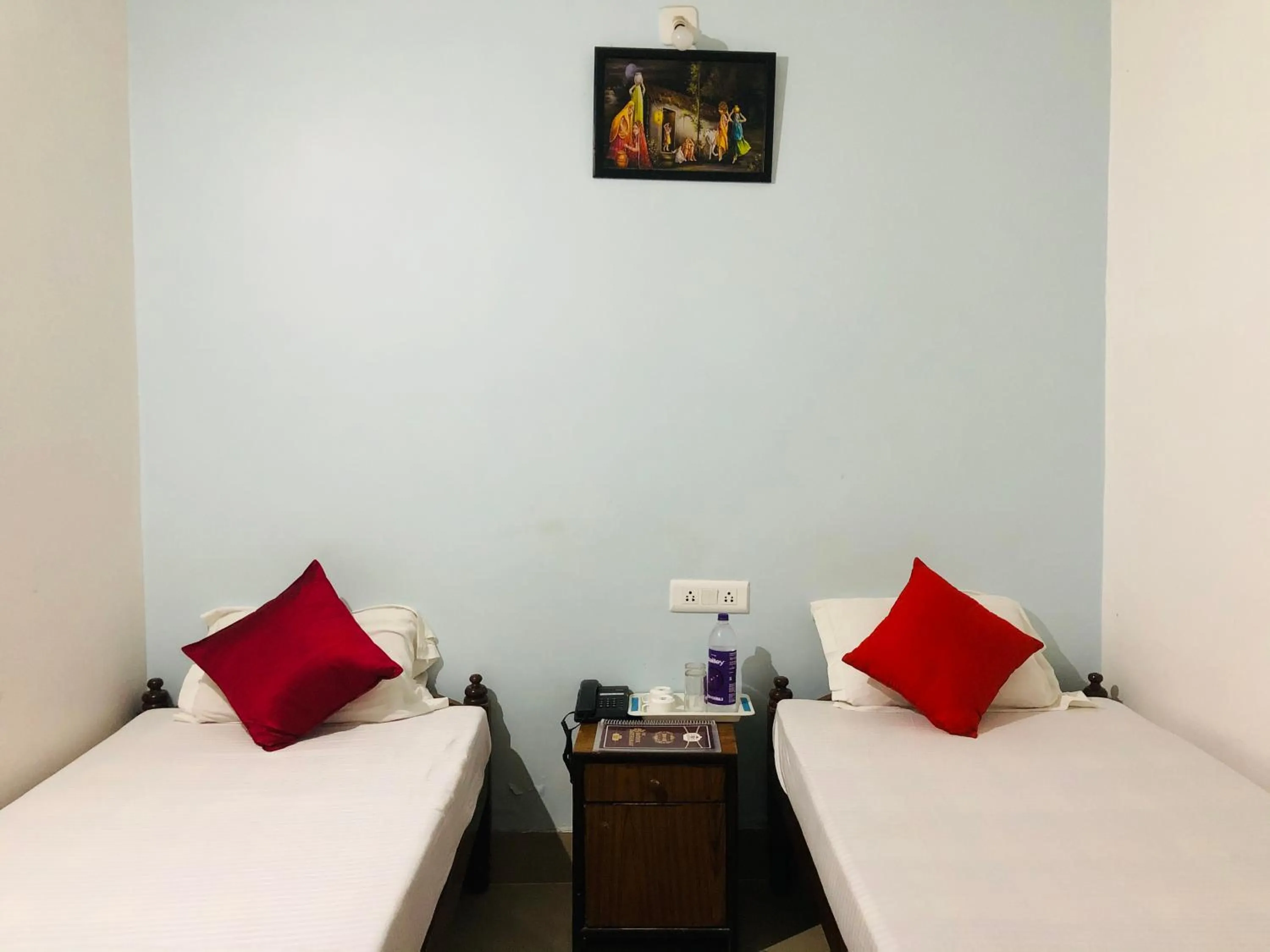 Bed in Satiya Guest House