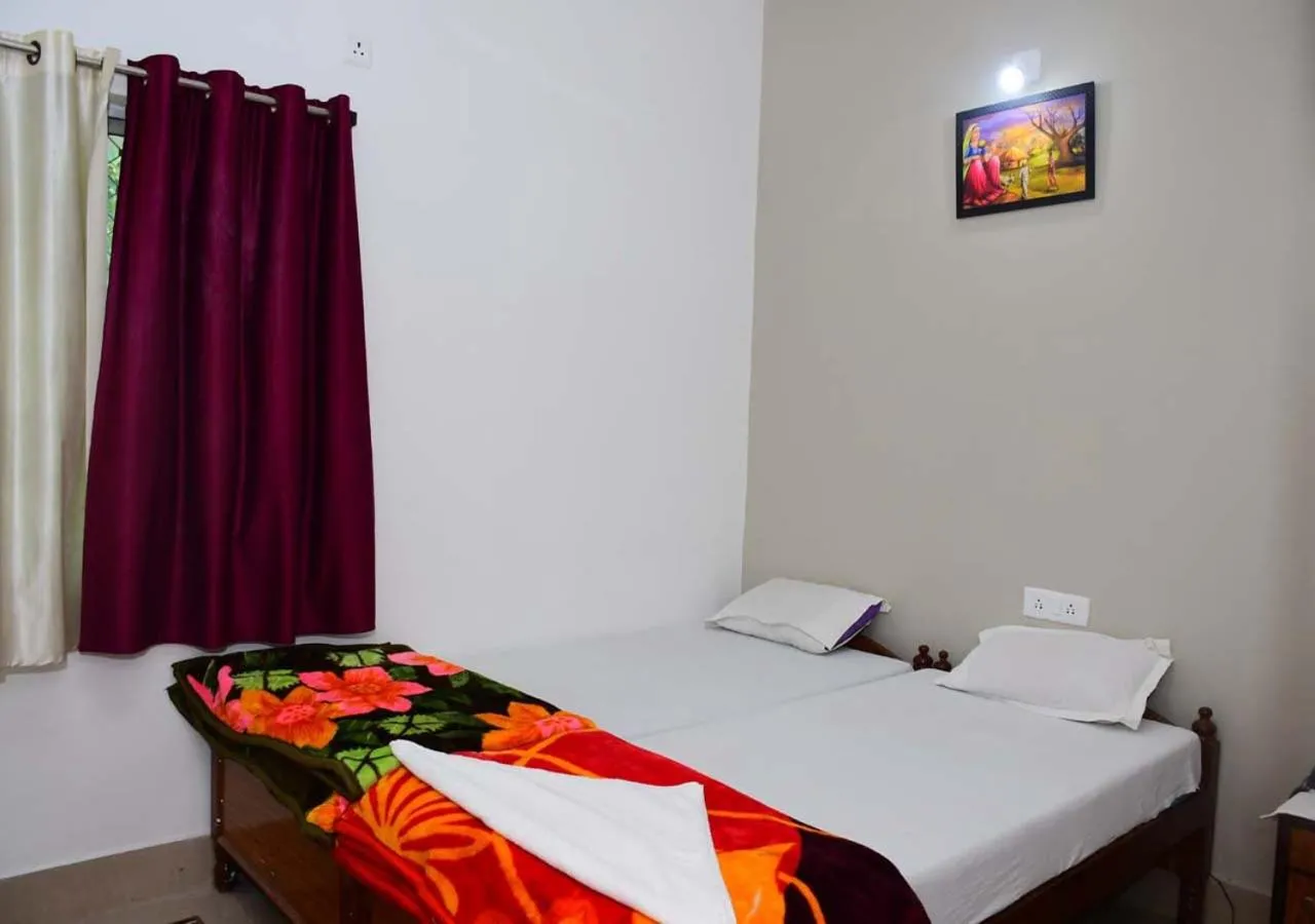 Bed in Satiya Guest House