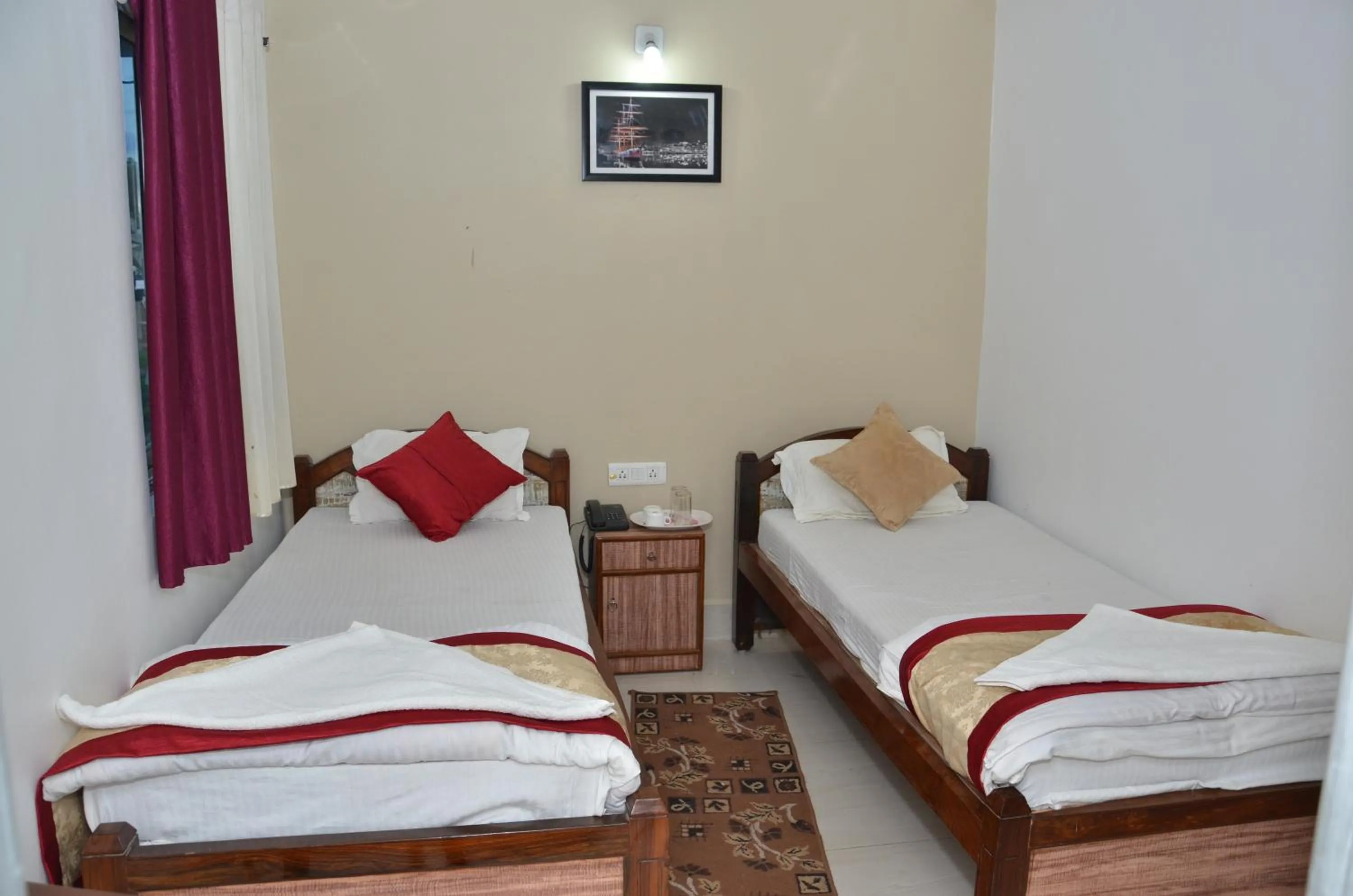Bed in Satiya Guest House