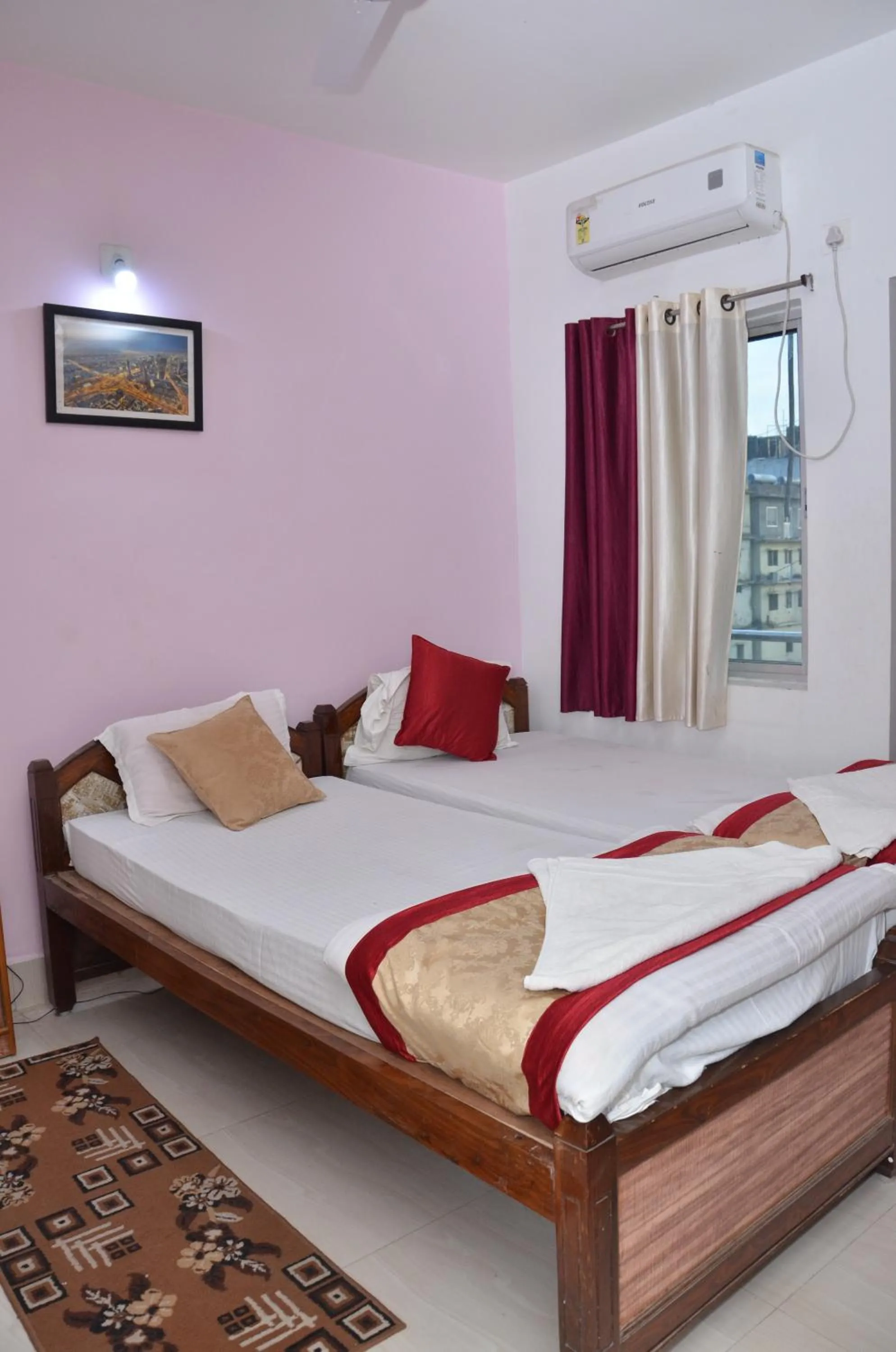 Bed in Satiya Guest House
