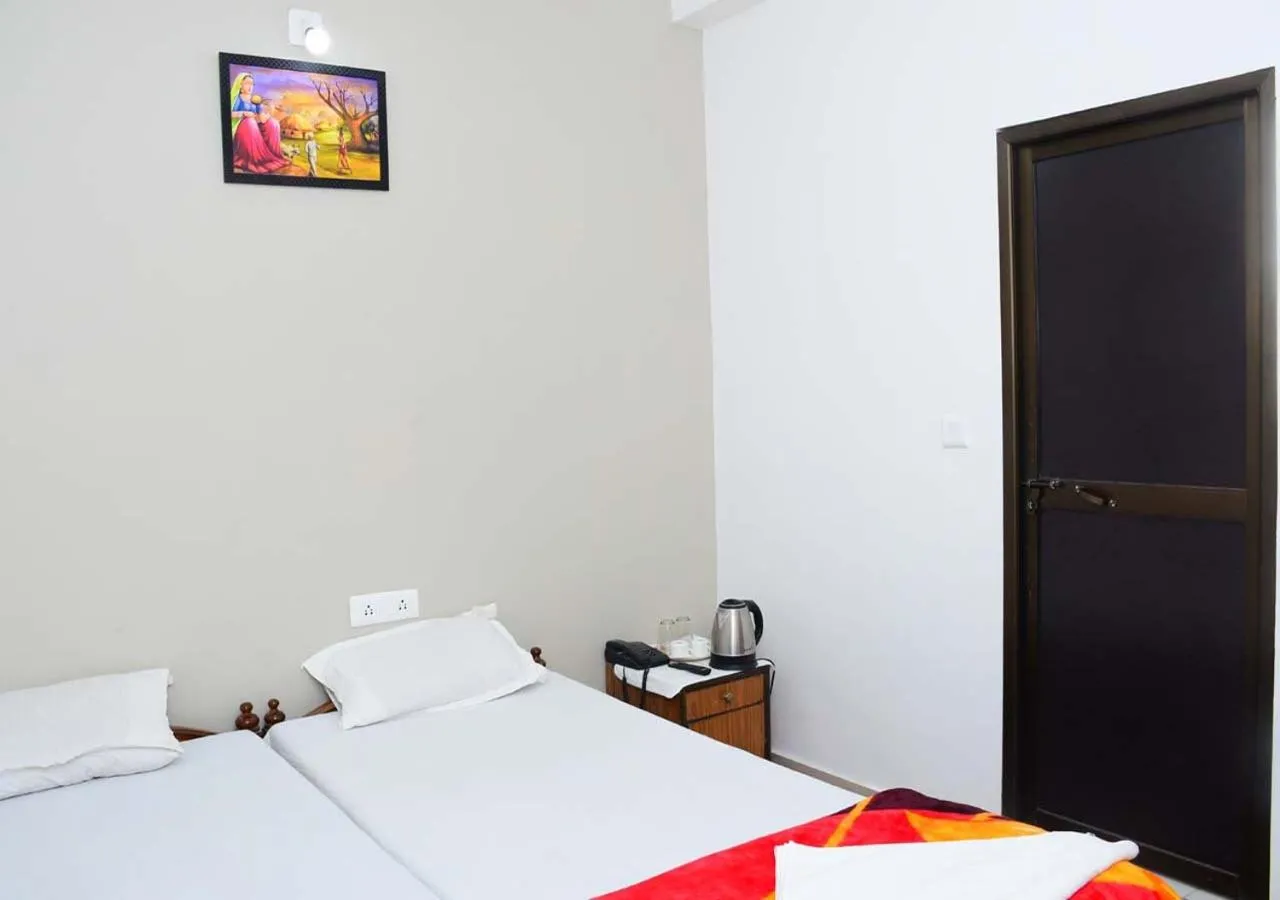 Bed in Satiya Guest House