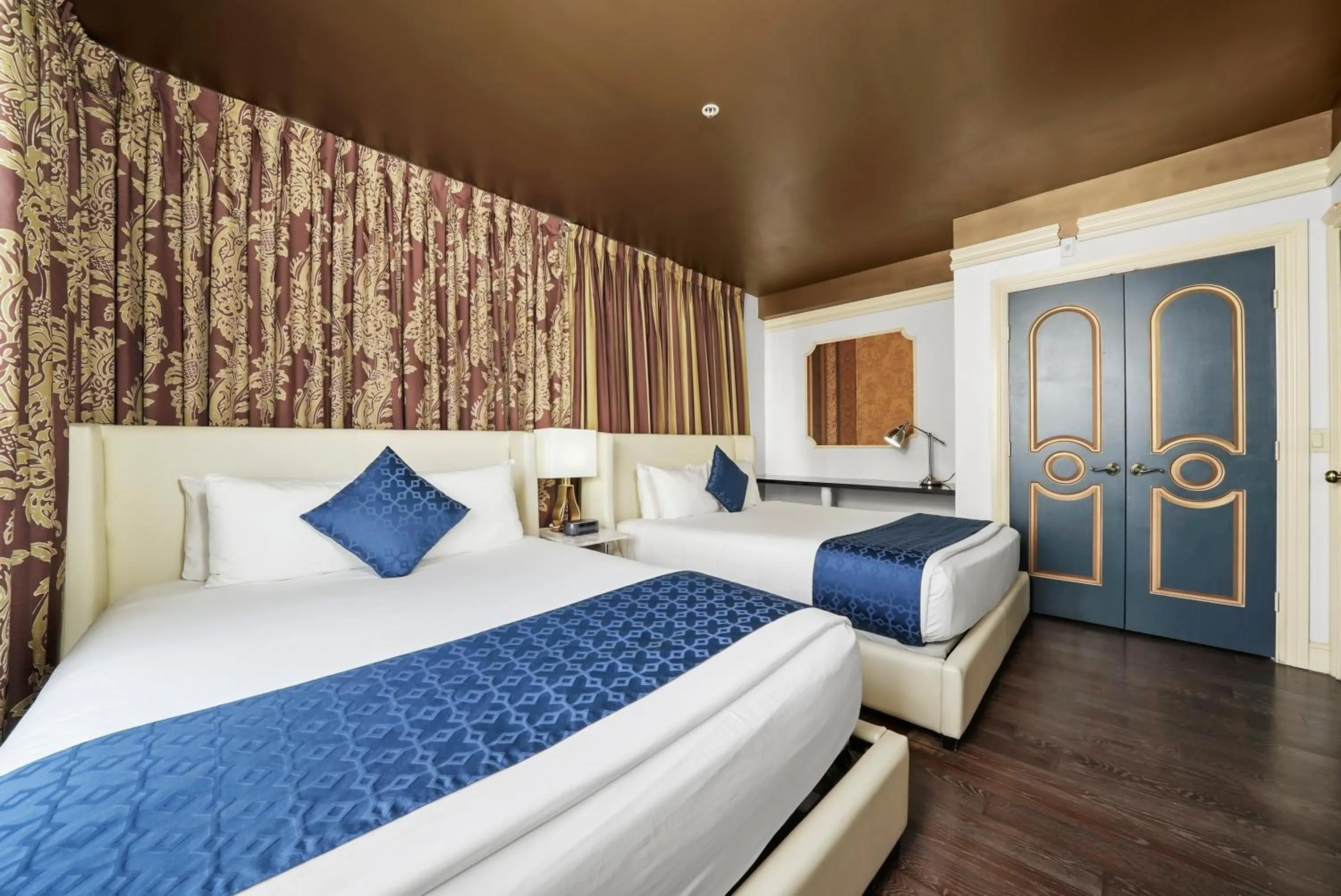 Bed in Riviera Suites