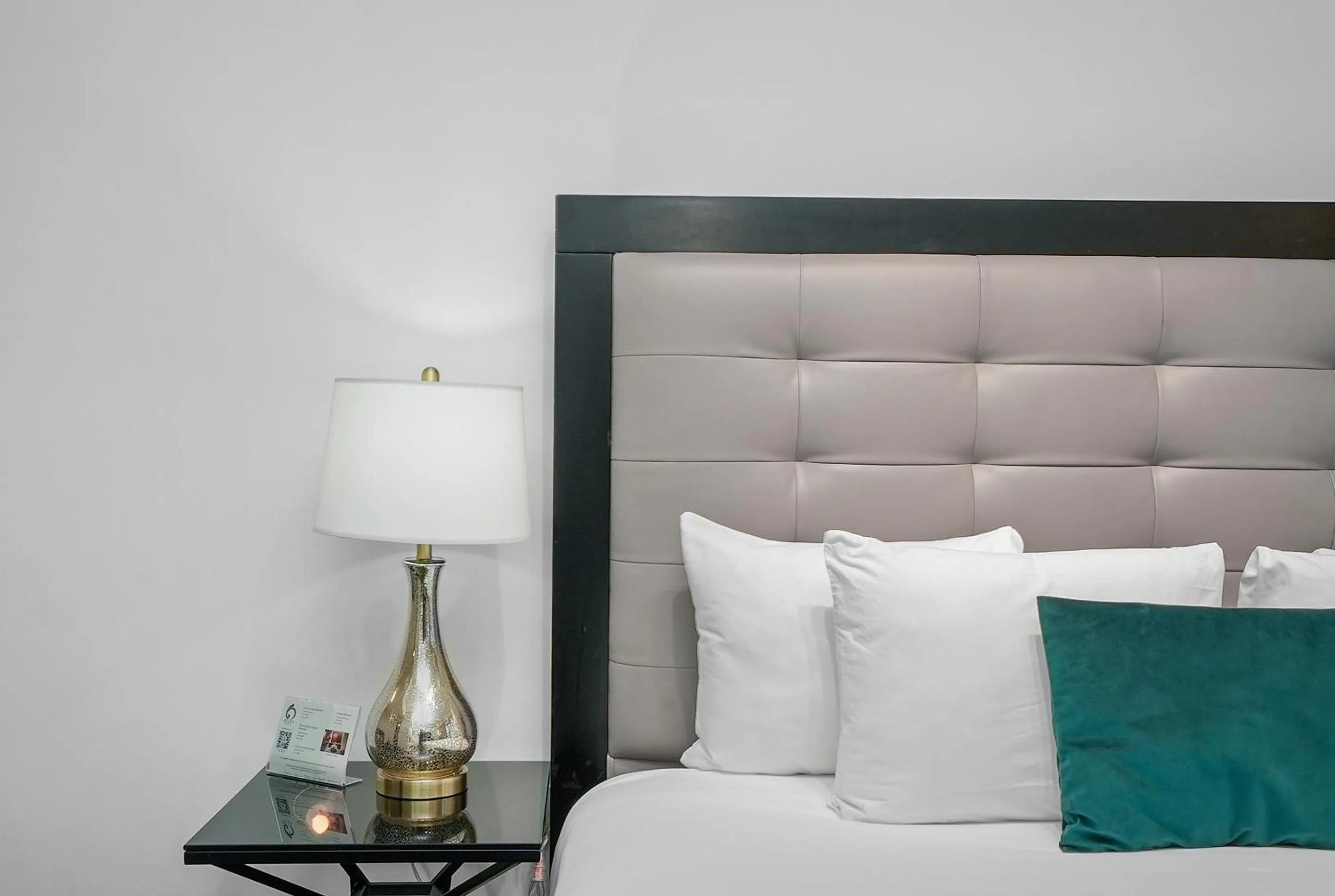 Bed in Riviera Suites