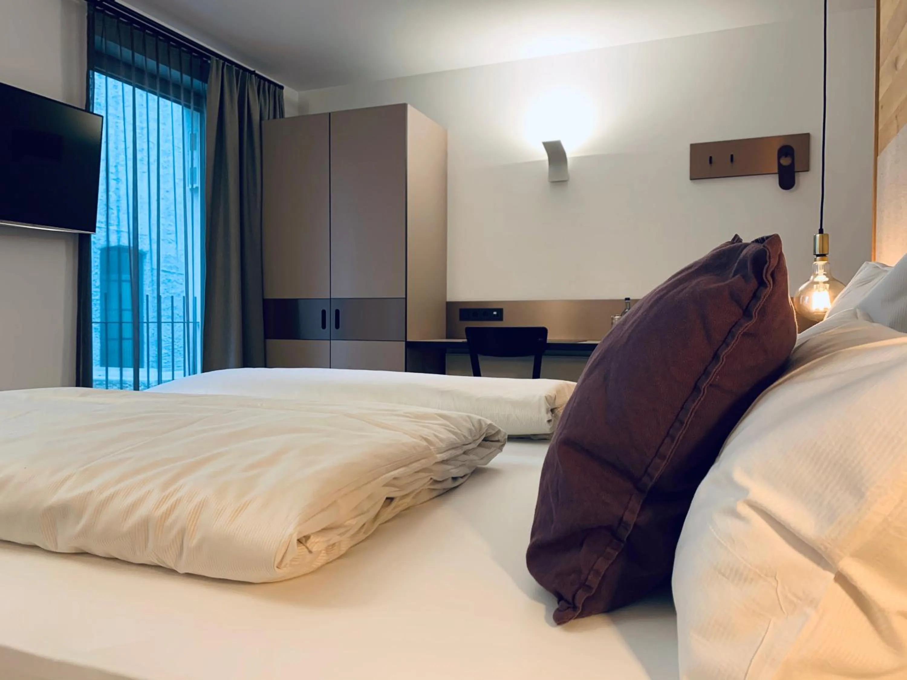 Bedroom, Bed in Stadthotel Kachelofen