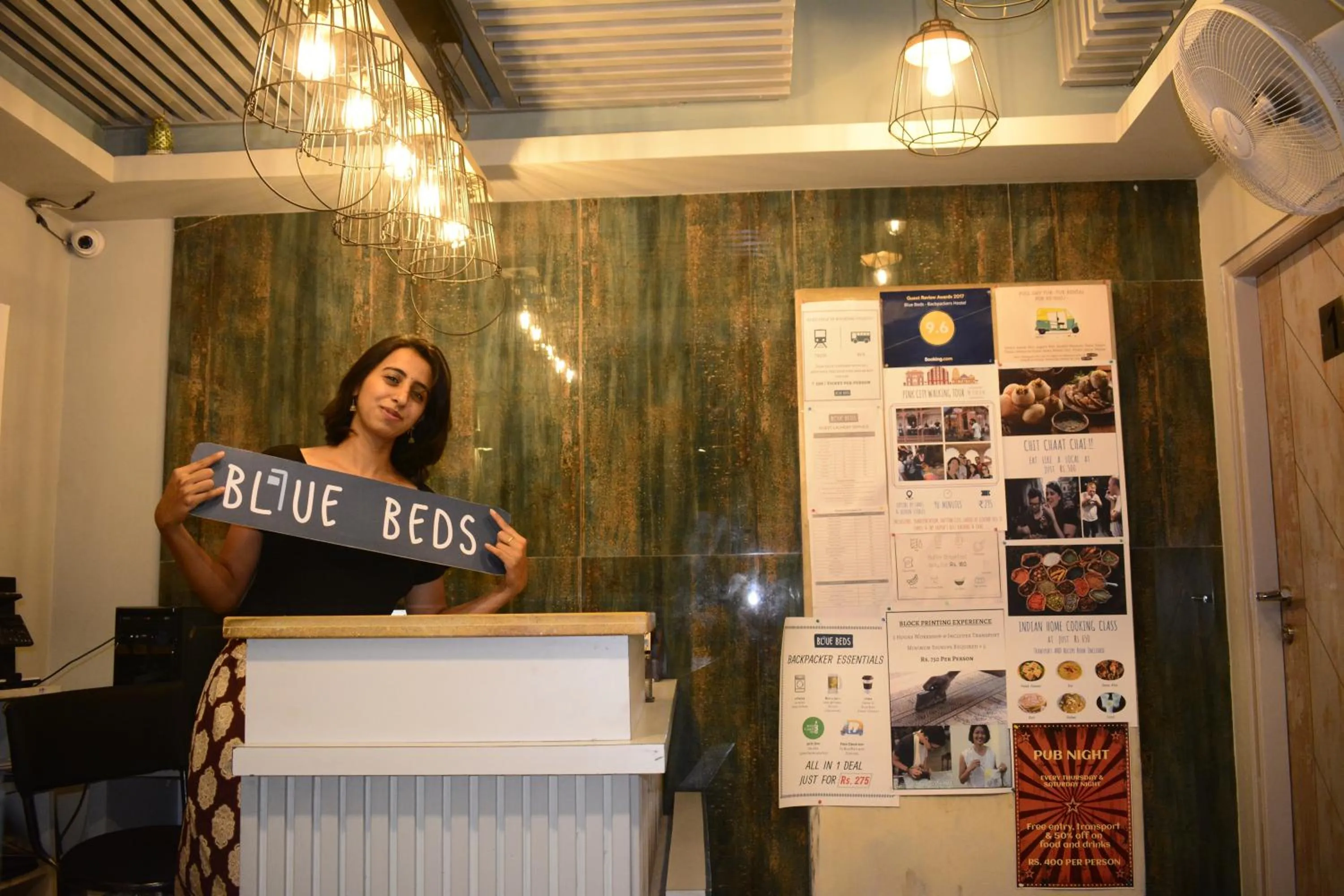 Staff in Blue Beds Hostel