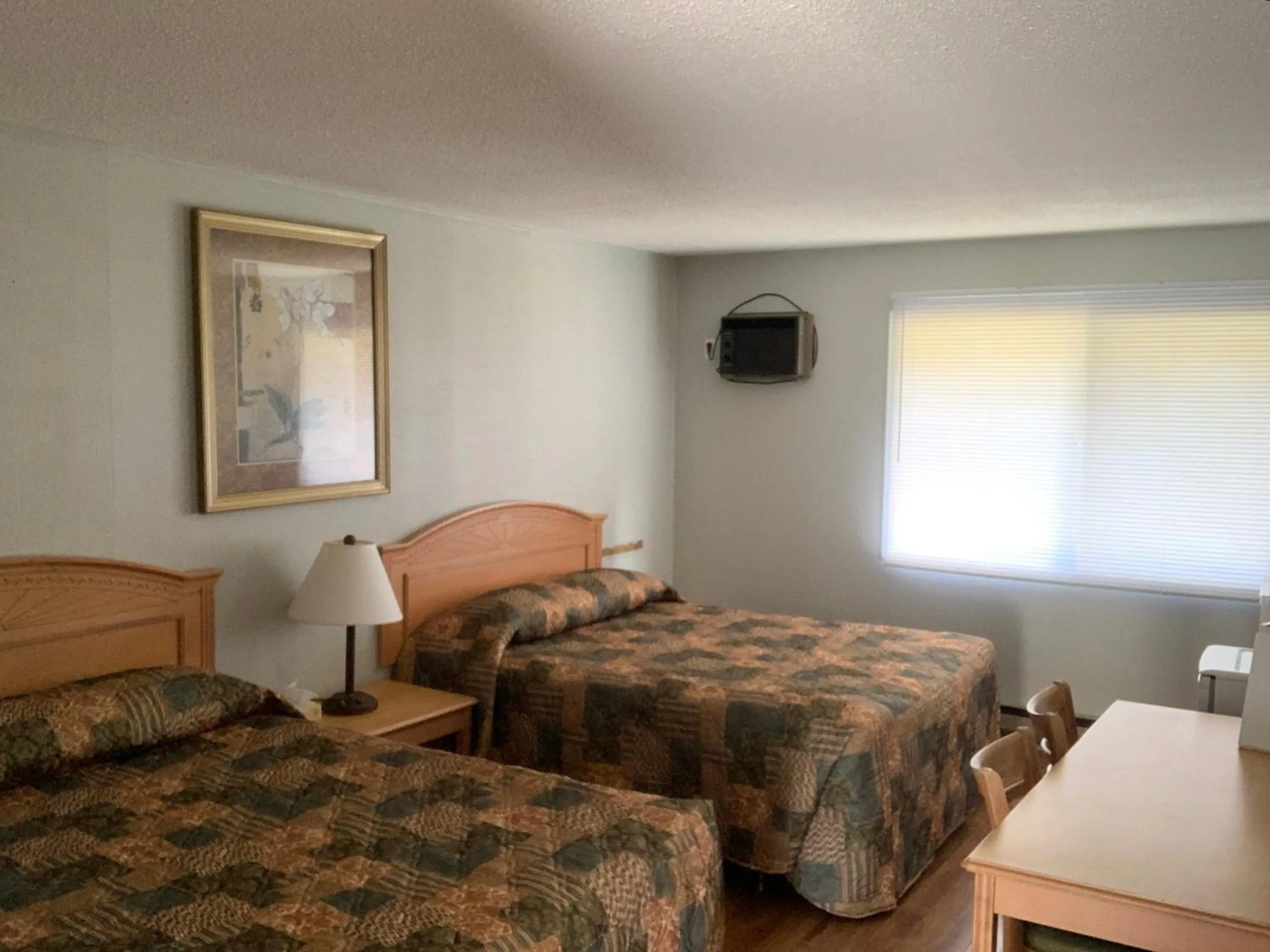 Bed in Green View Motel and RV Park