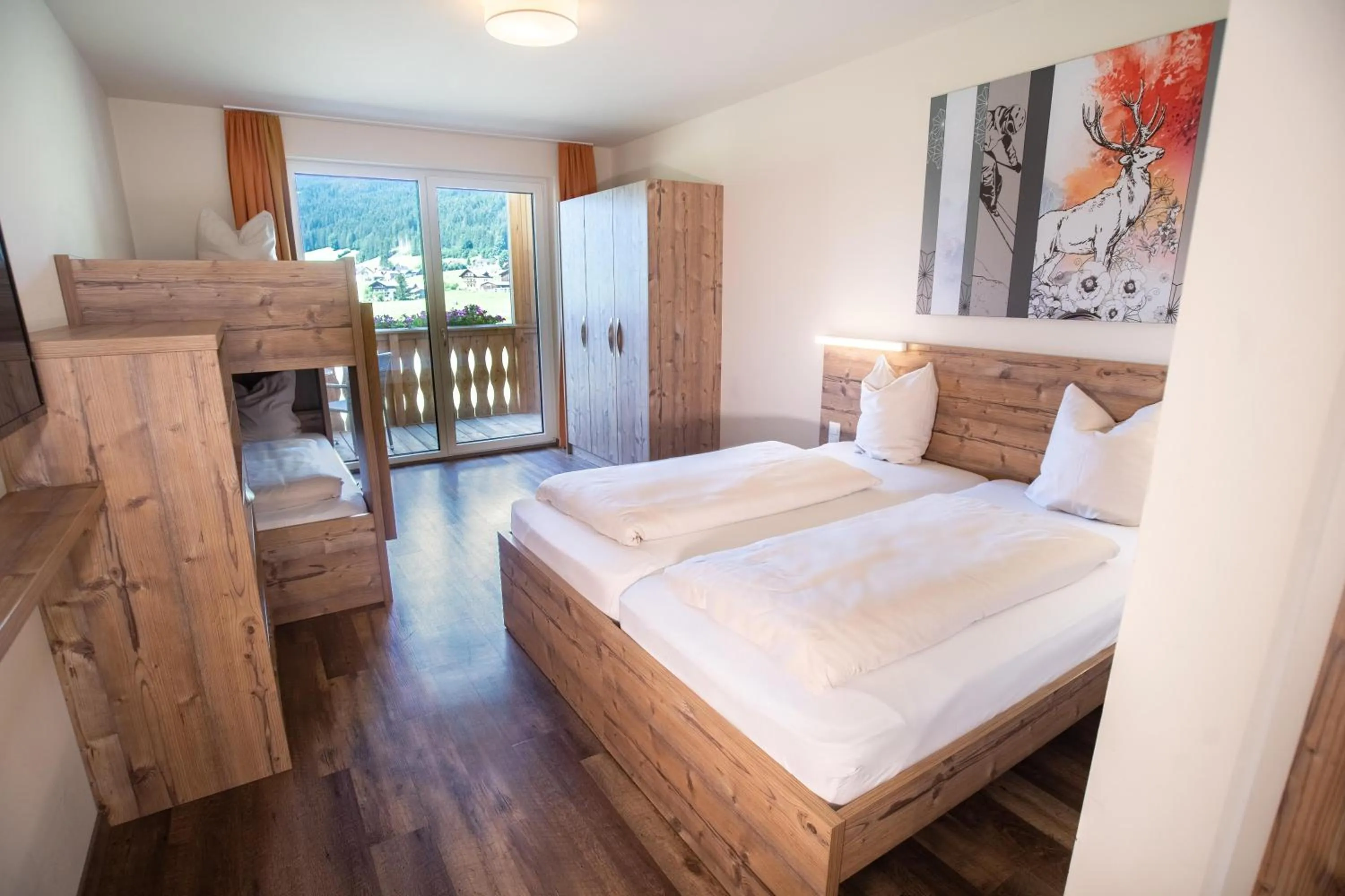 Bed in COOEE alpin Hotel Dachstein