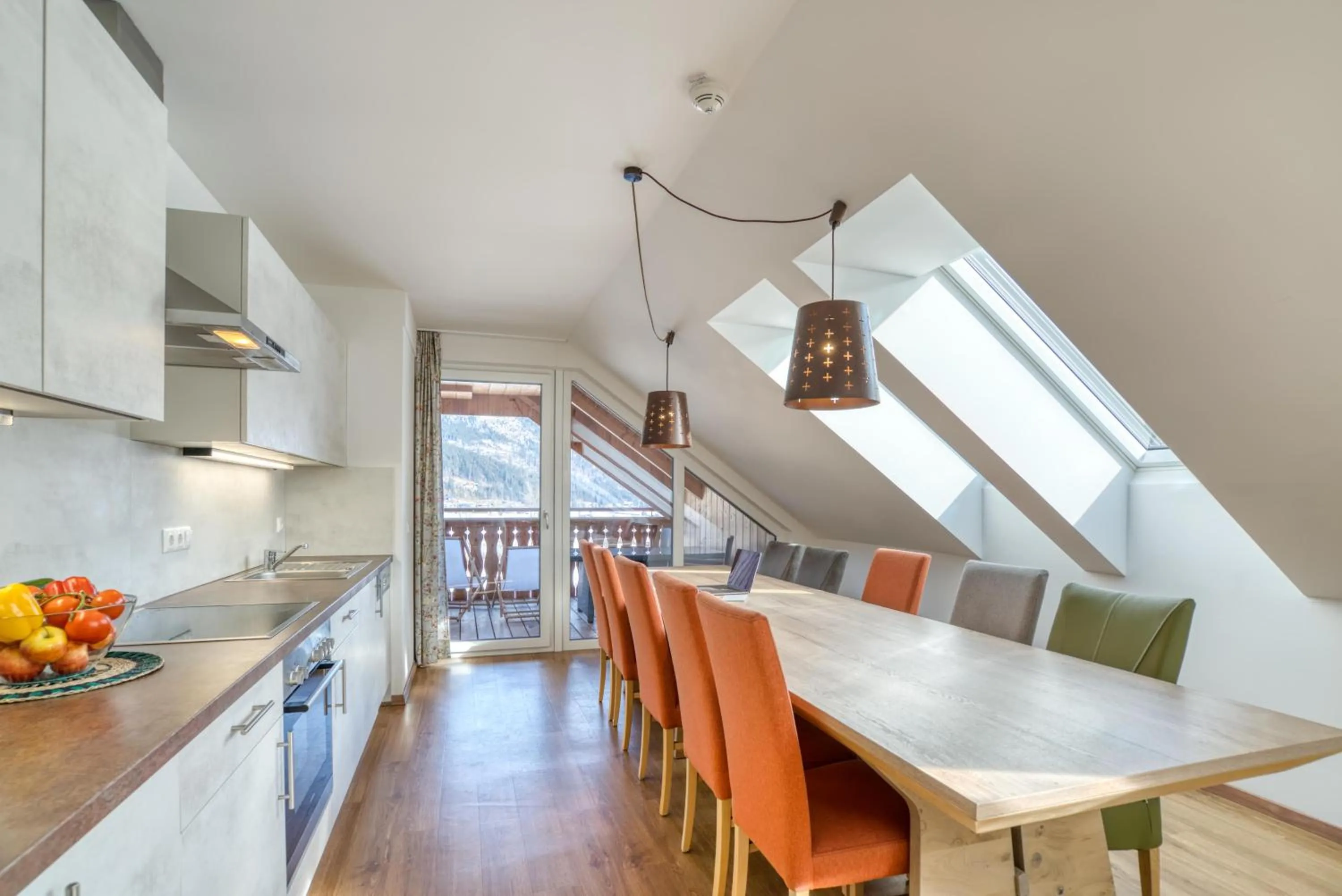 Kitchen or kitchenette in COOEE alpin Hotel Dachstein