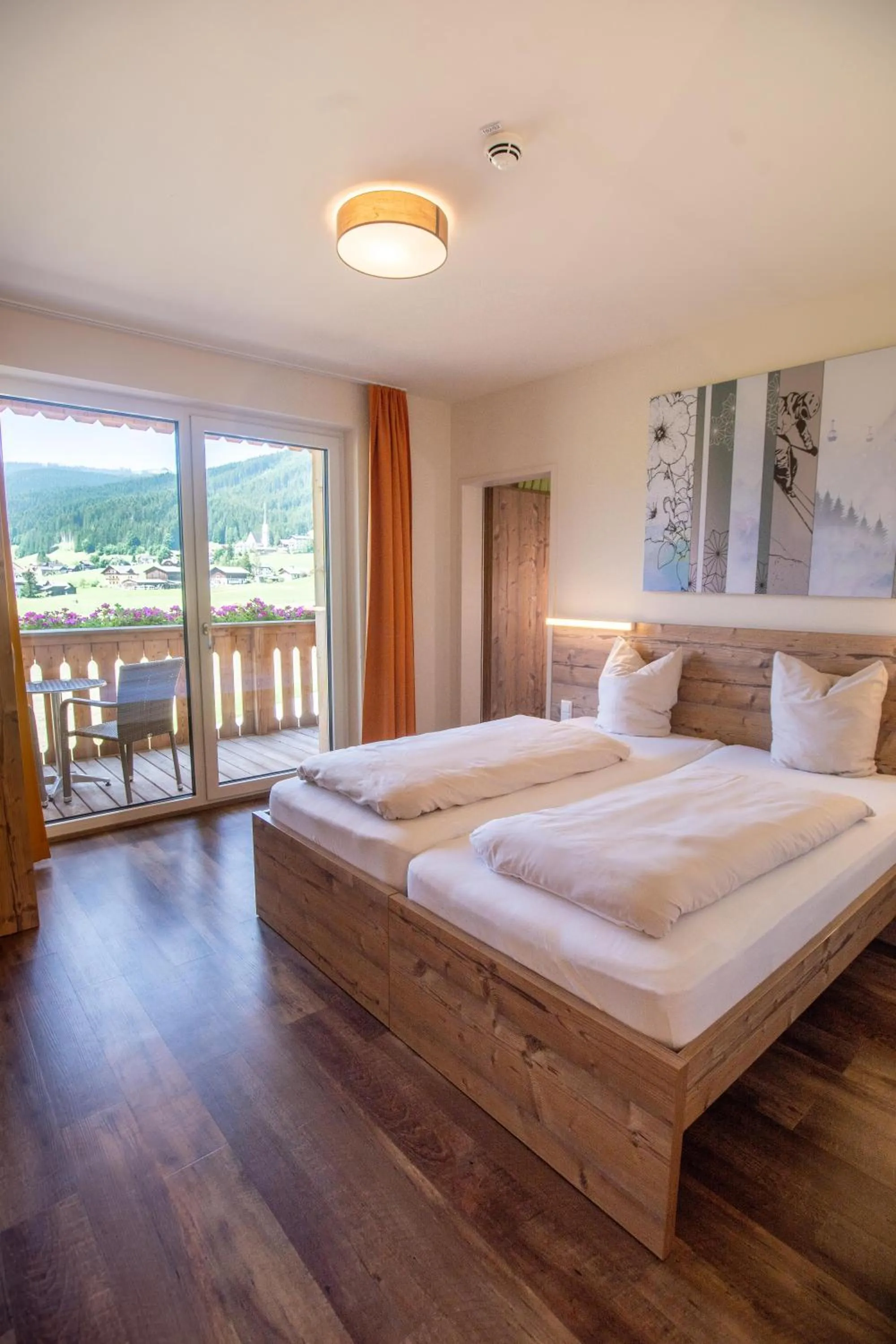 Photo of the whole room, Bed in COOEE alpin Hotel Dachstein