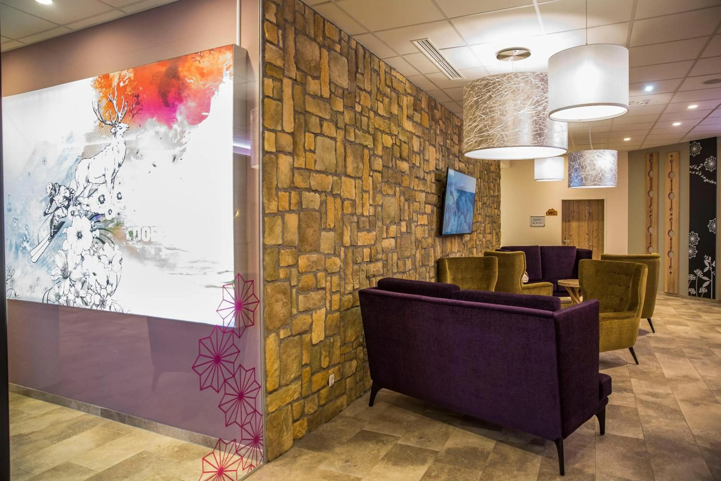 Lobby or reception in COOEE alpin Hotel Dachstein