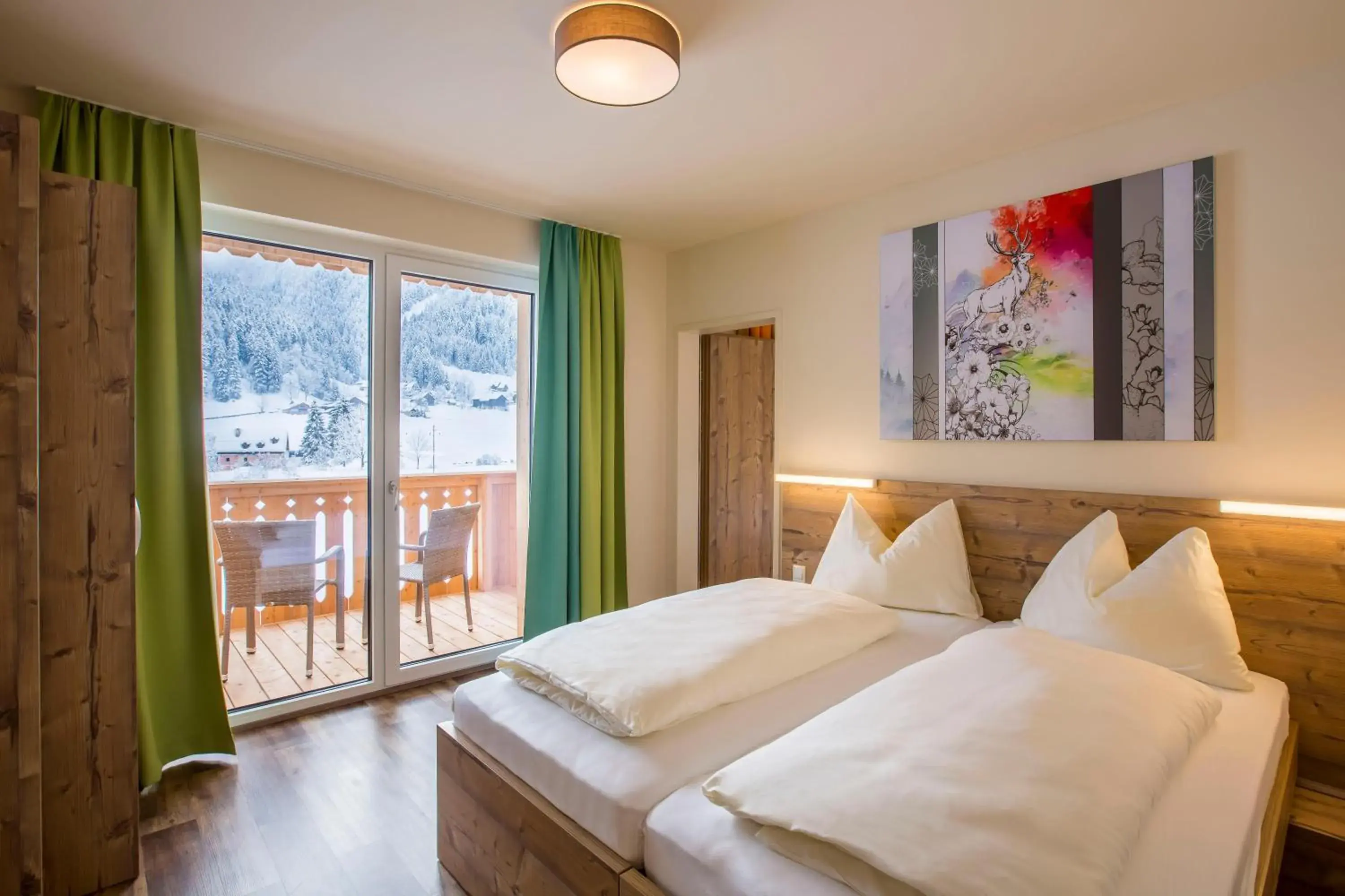Family Room with Balcony (2 Adults + 2 Children) in COOEE alpin Hotel Dachstein Family Room with Balcony (2 Adults + 2 Children) in COOEE alpin Hotel Dachstein